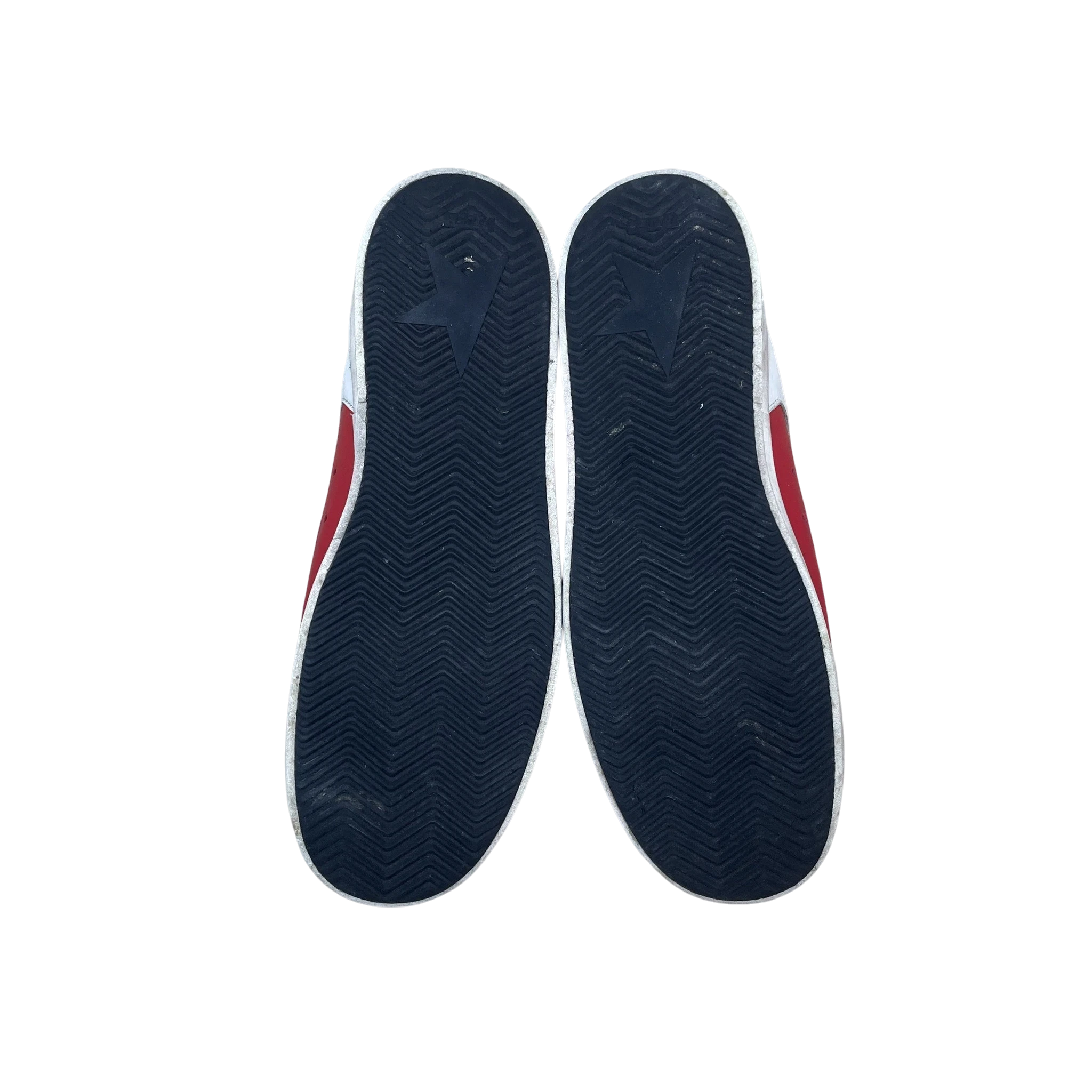 Zenno Archive Golden Goose Stardan leather sneakers in red and white, showing the black rubber outsoles.