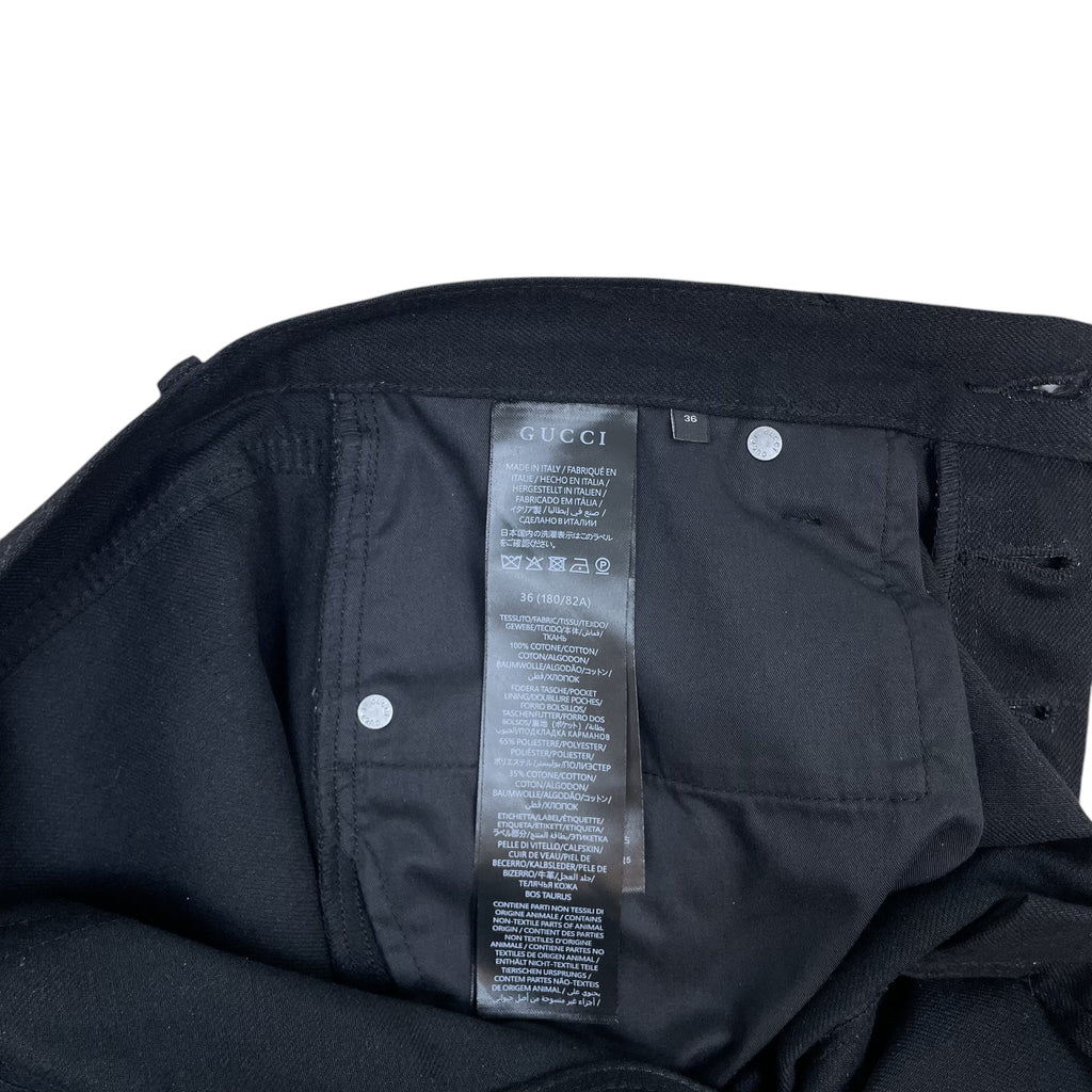 Zenno Archive Gucci AW25 black cotton jeans interior label showing size 36 and care instructions
