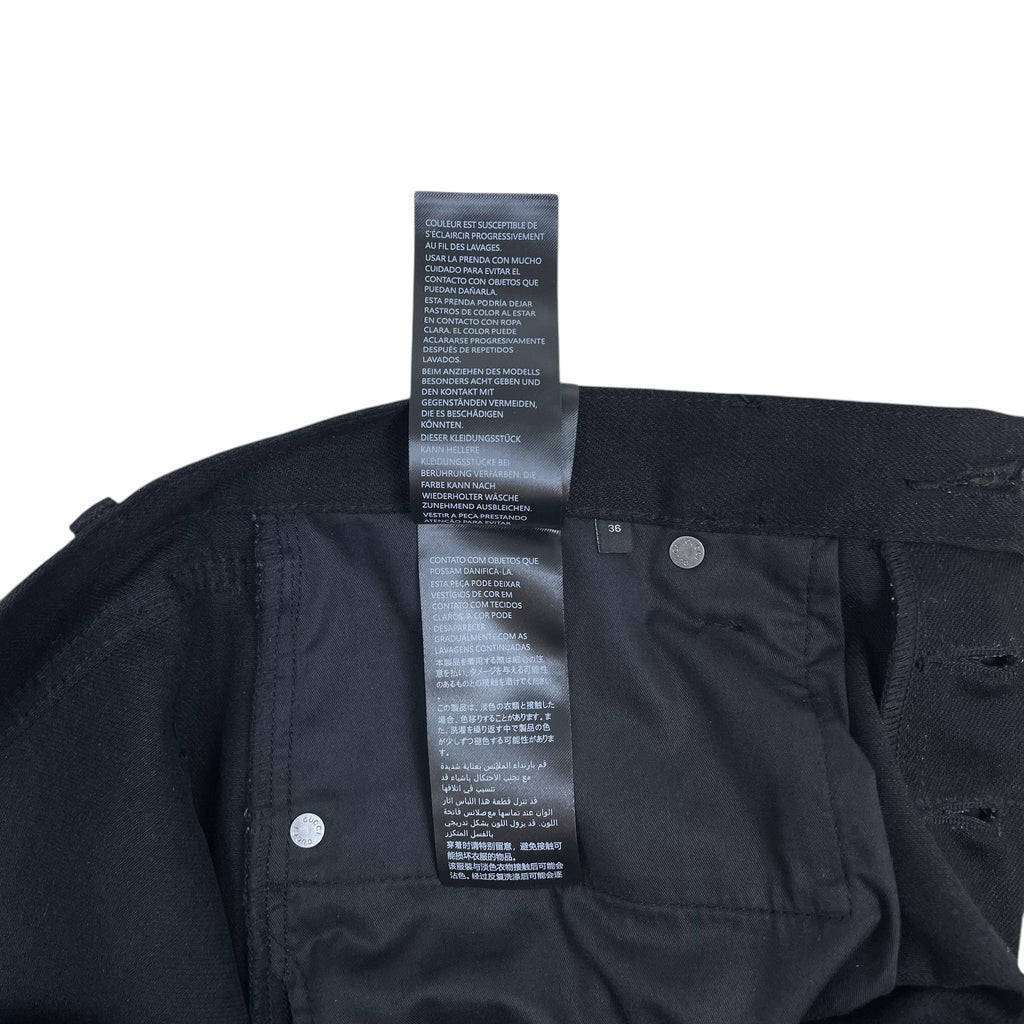 Zenno Archive Gucci AW25 black denim jeans interior care label and size 36 tag detail