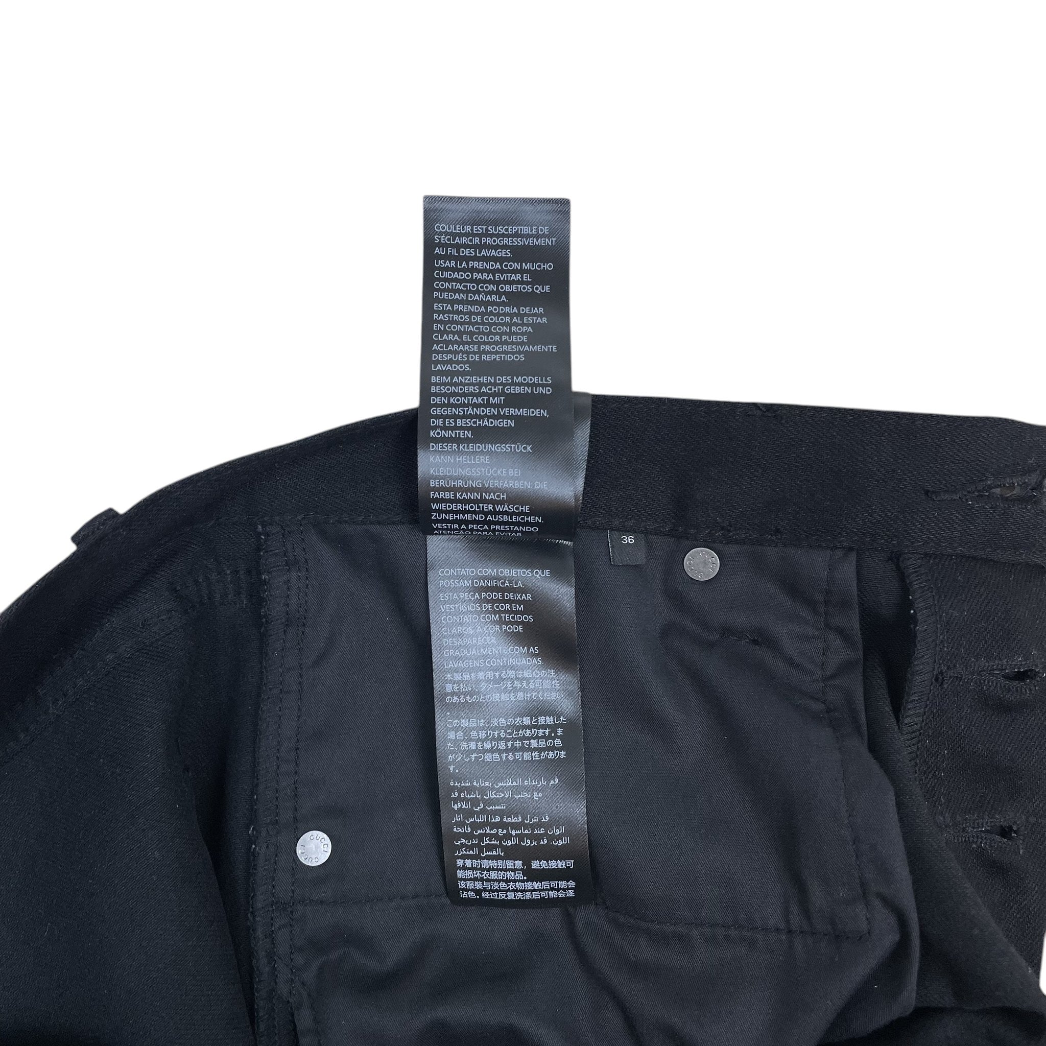 Zenno Archive Gucci AW25 black denim jeans interior care label and size 36 tag detail