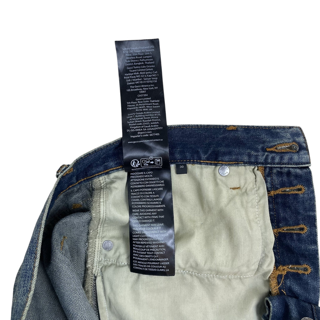 Zenno Archive Gucci AW25 Horsebit jeans in washed blue denim with interior care and brand information labels