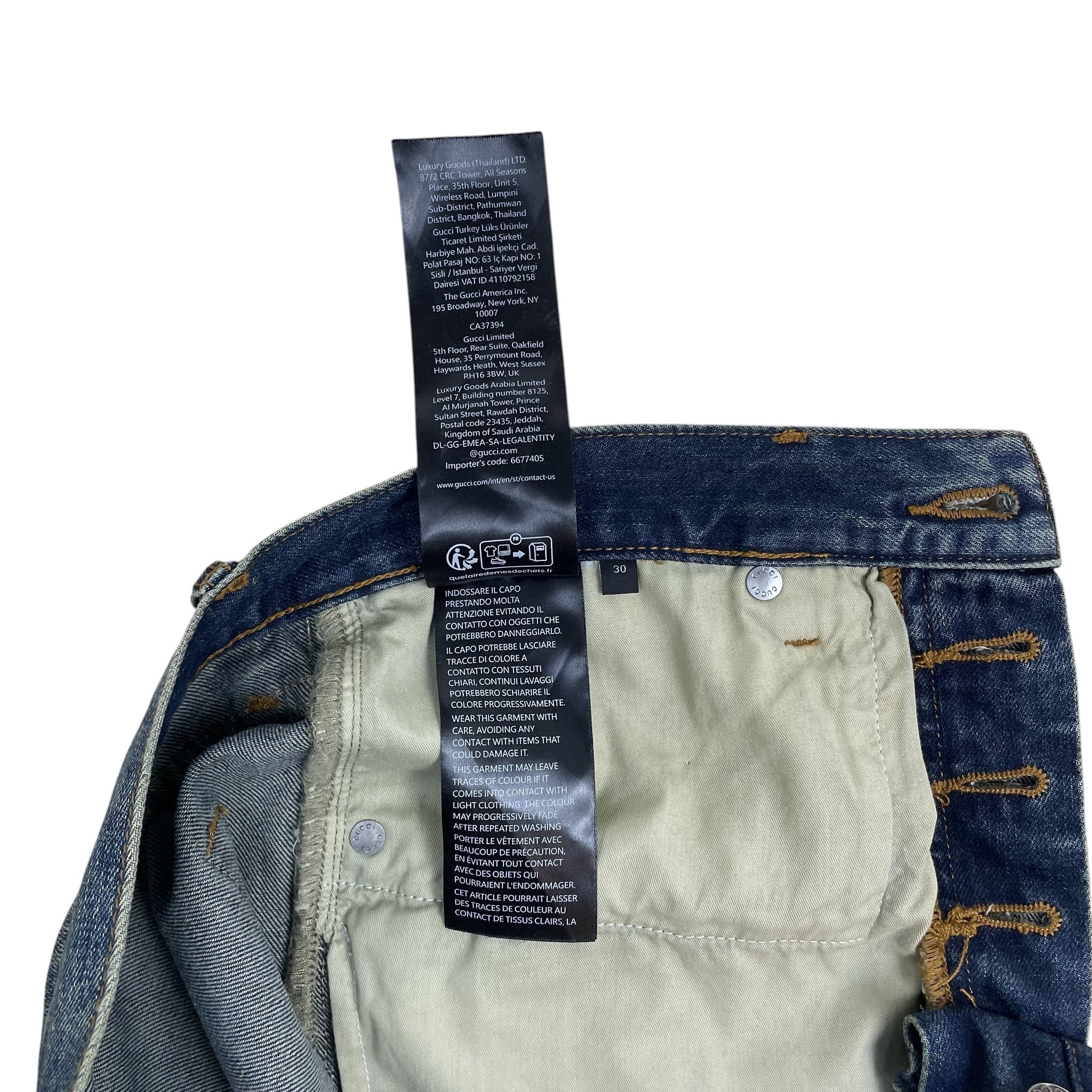 Zenno Archive Gucci AW25 Horsebit jeans in washed blue denim with interior care and brand information labels