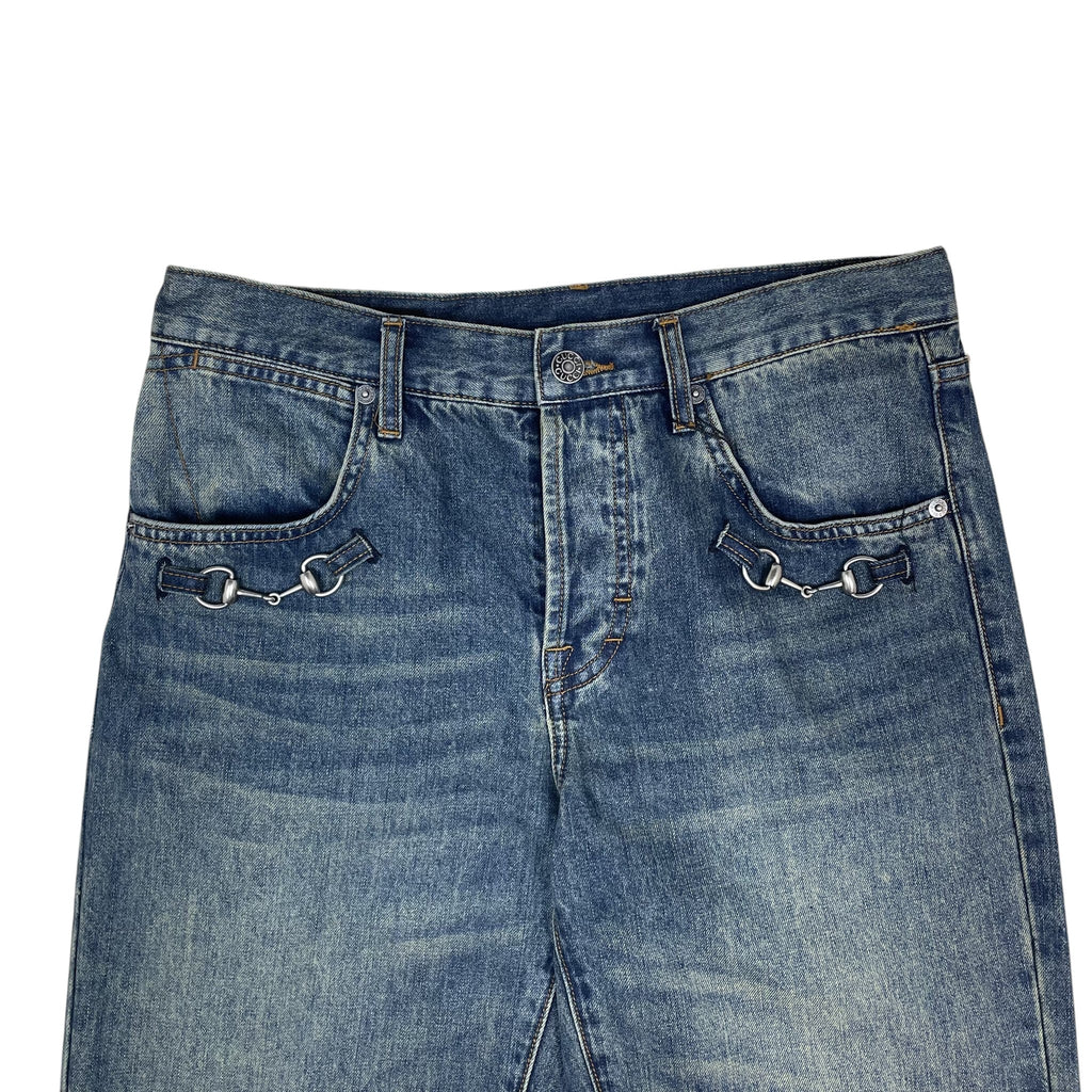 Zenno Archive Gucci AW25 washed blue denim jeans featuring signature silver-tone horsebit hardware on front pockets.
