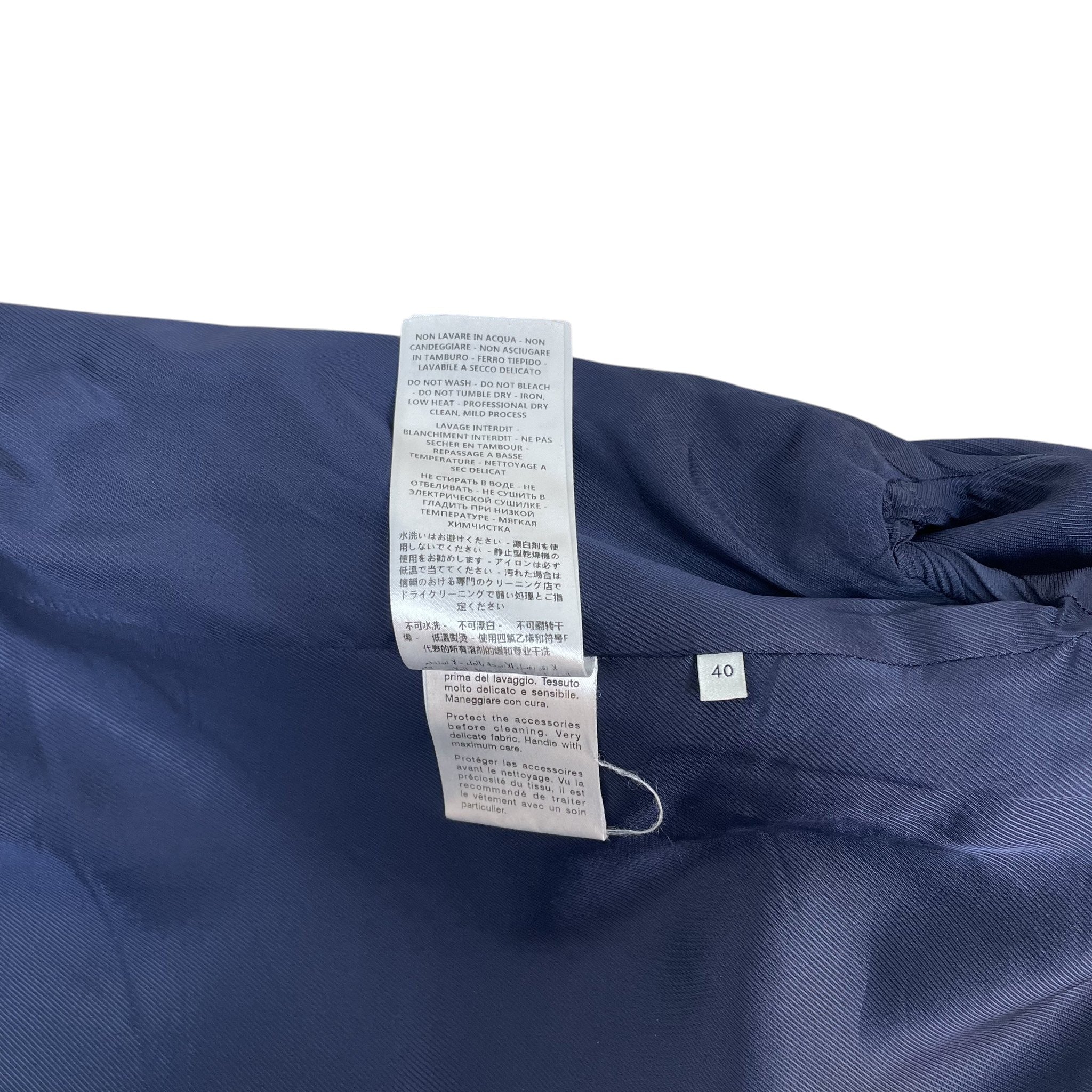Zenno Archive Gucci wool-blend zip jacket interior care label and size 40 tag in navy blue fabric