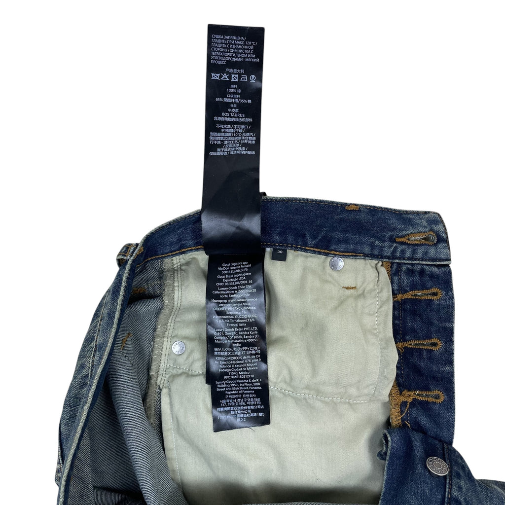 Zenno Archive Gucci AW25 Horsebit jeans interior care label and size 30 tag on washed blue denim