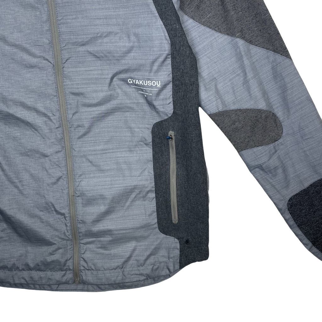 Zenno Archive Nike x Undercover Gyakusou grey technical running jacket with contrast dark grey panels and zip pocket