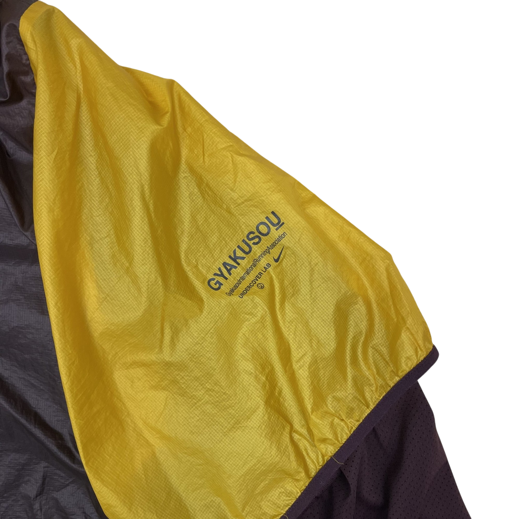 Zenno Archive Nike x Undercover Gyakusou SS19 Transform Jacket in burgundy and yellow with logo branding