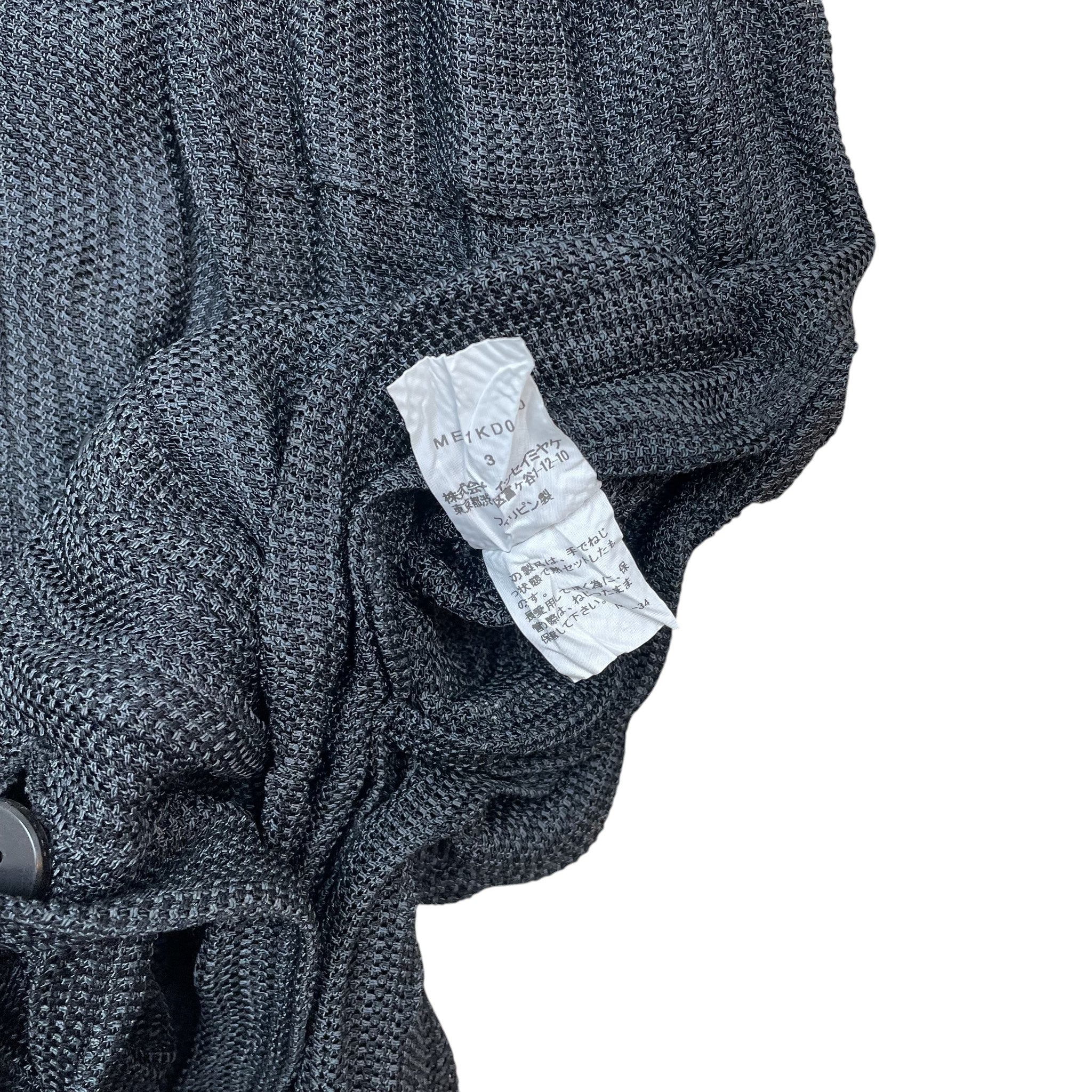 Zenno Archive Issey Miyake Men SS15 runway shirt featuring a grey crinkled textured fabric and internal care label