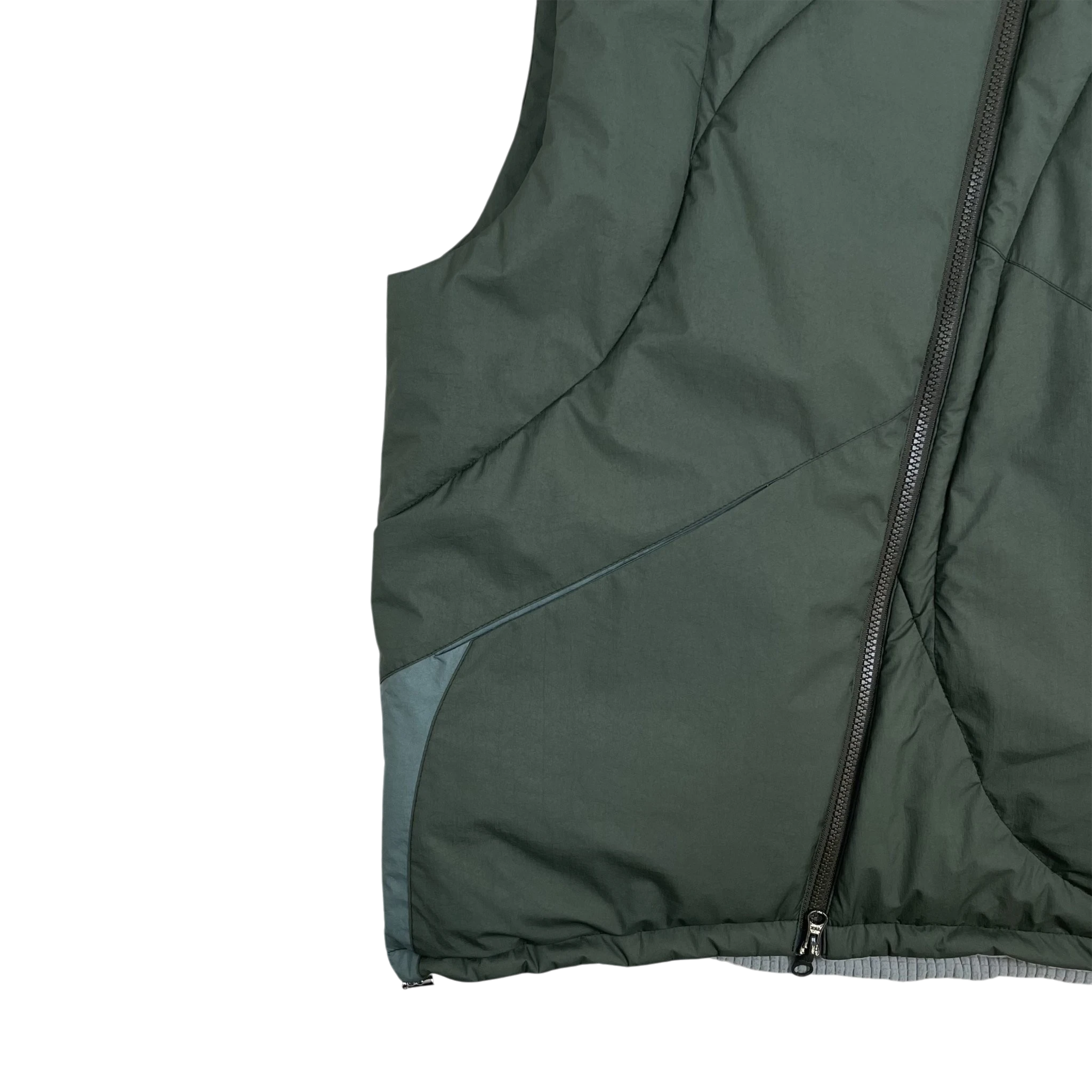 Zenno Archive Jeong Li 3M Thinsulate reversible vest in dark green with a full zip closure and panel detailing.