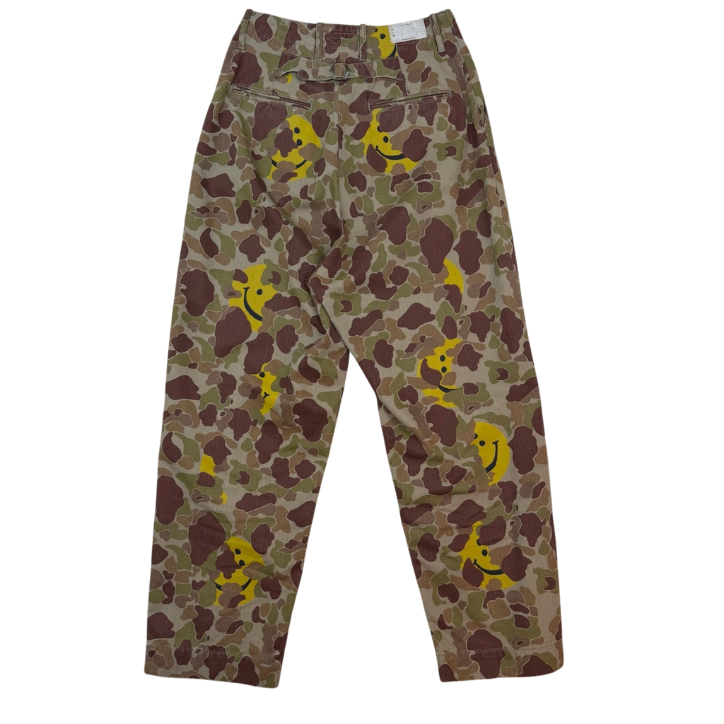 Zenno Archive Kapital herringbone camouflage pants featuring yellow happy face graphics in a relaxed fit