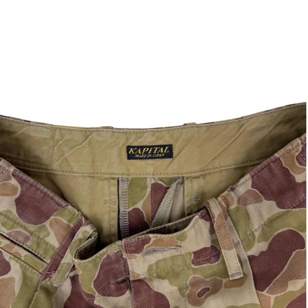 Zenno Archive Kapital herringbone camouflage neem pants featuring a signature interior tag detail