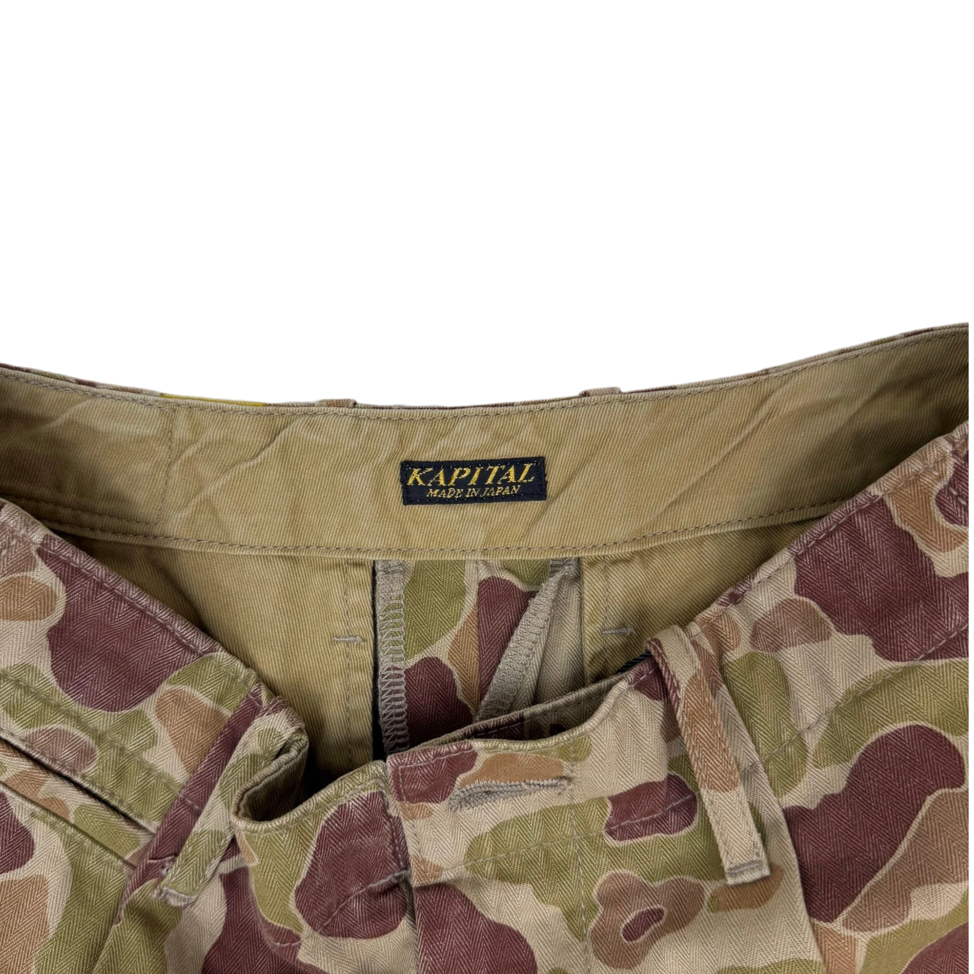 Zenno Archive Kapital herringbone camouflage neem pants featuring a signature interior tag detail