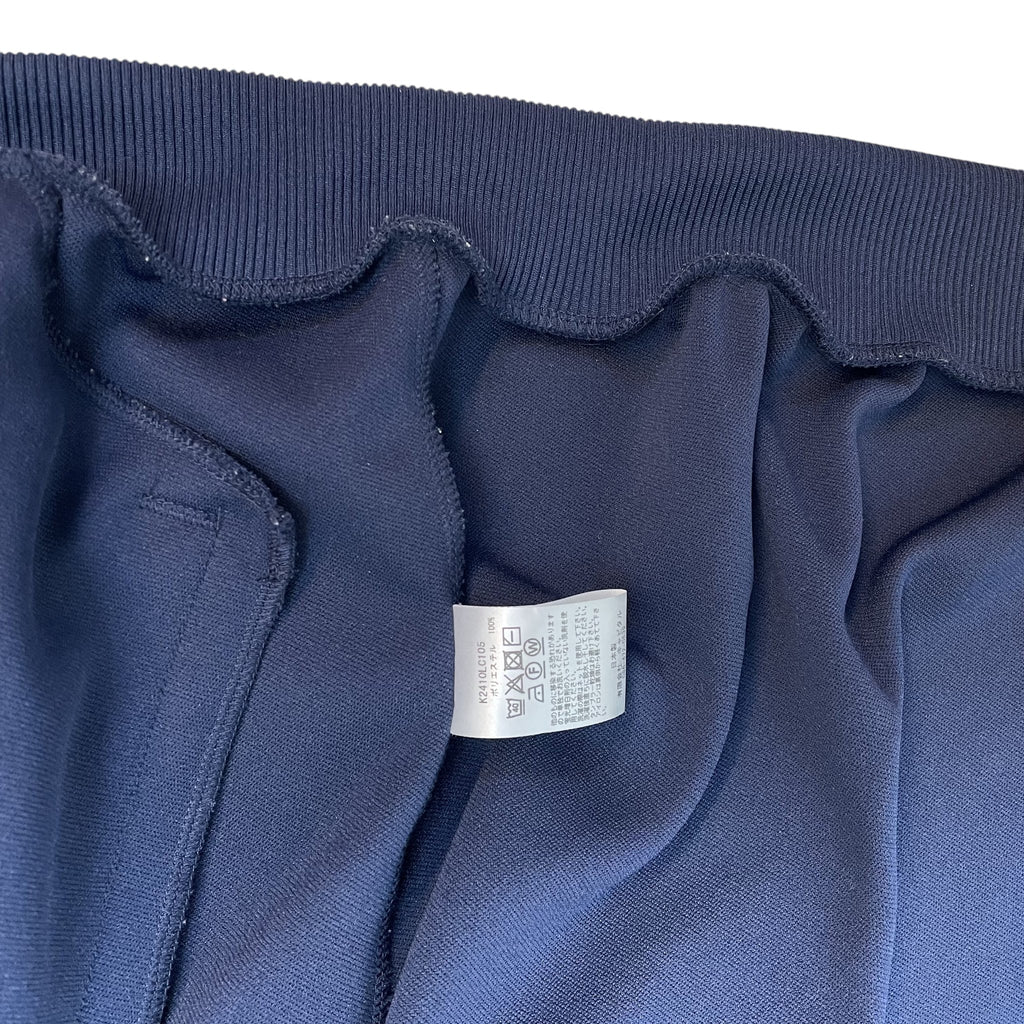 Zenno Archive Kapital navy blue smooth jersey track jacket interior showing care label and ribbed collar detail