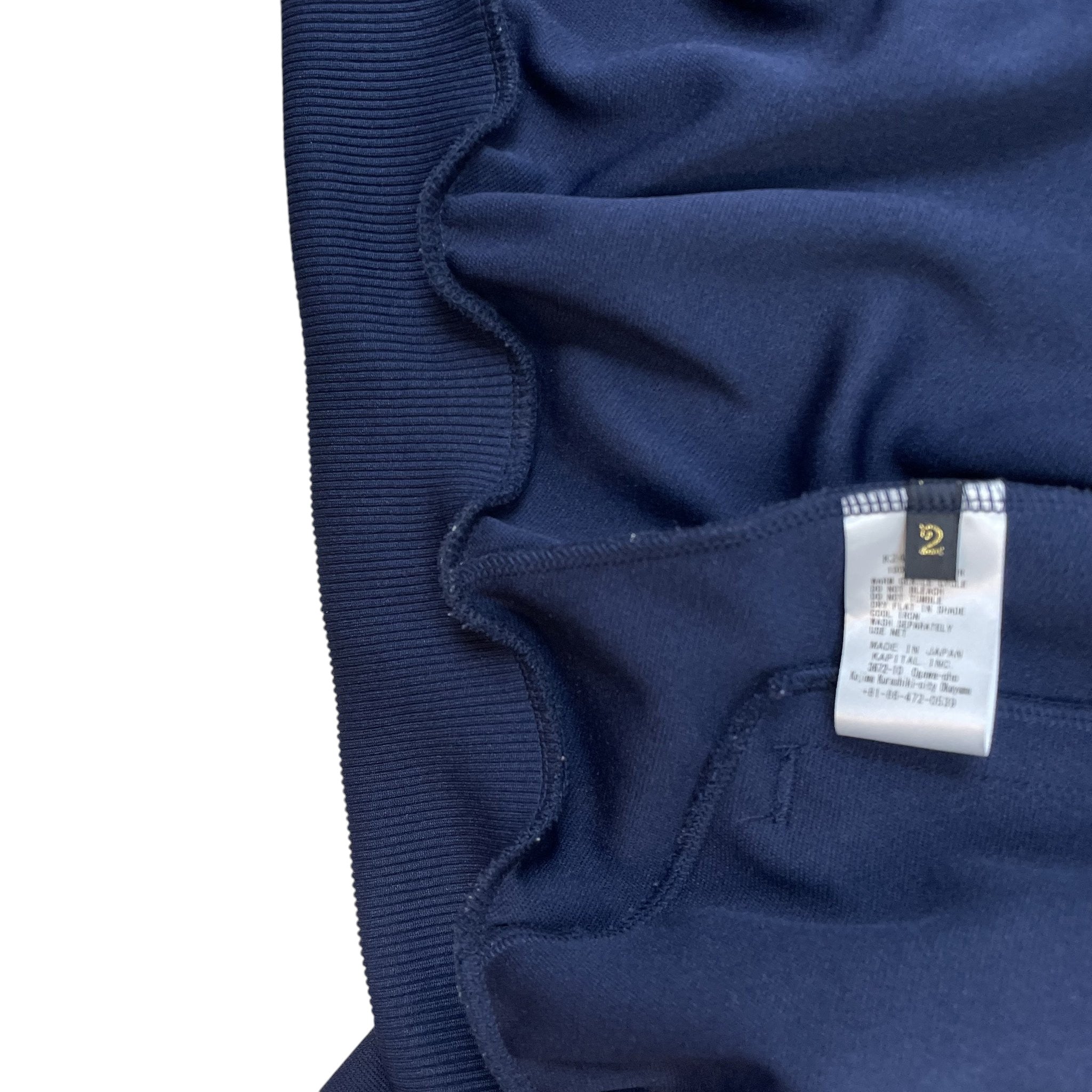 Zenno Archive Kapital navy smooth jersey track jacket interior label and ribbed hem detail