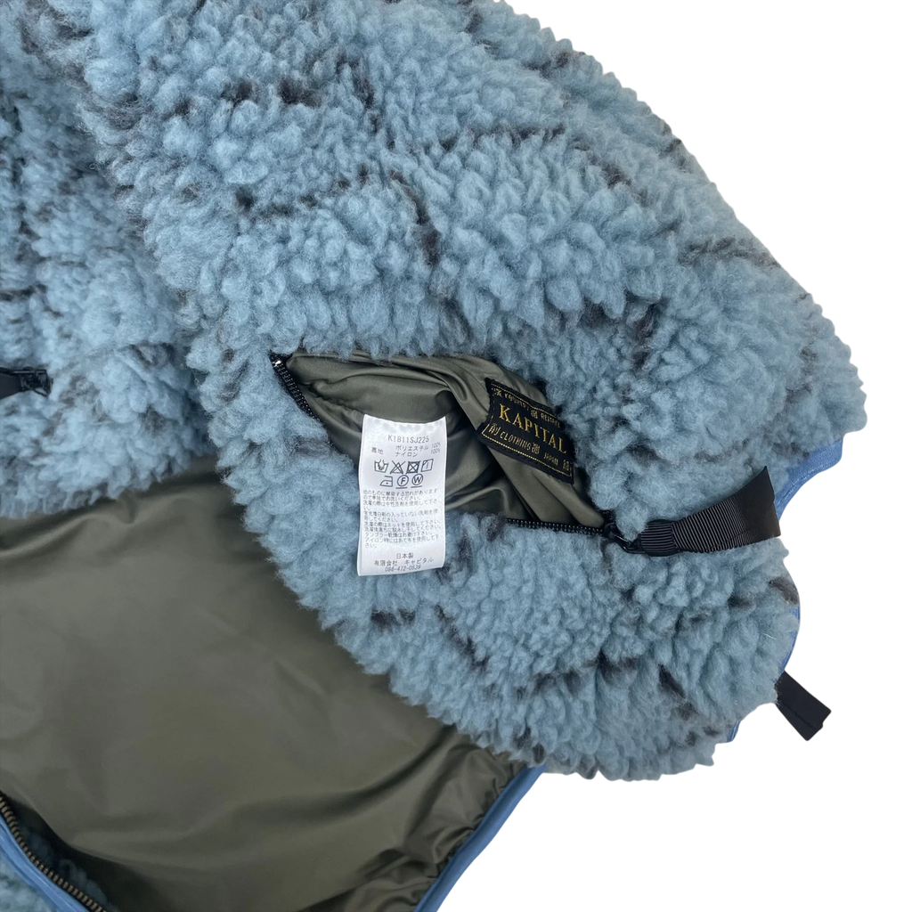 Zenno Archive Kapital DO-GI SASHIKO reversible vest featuring blue boa fleece and olive green lining with brand label