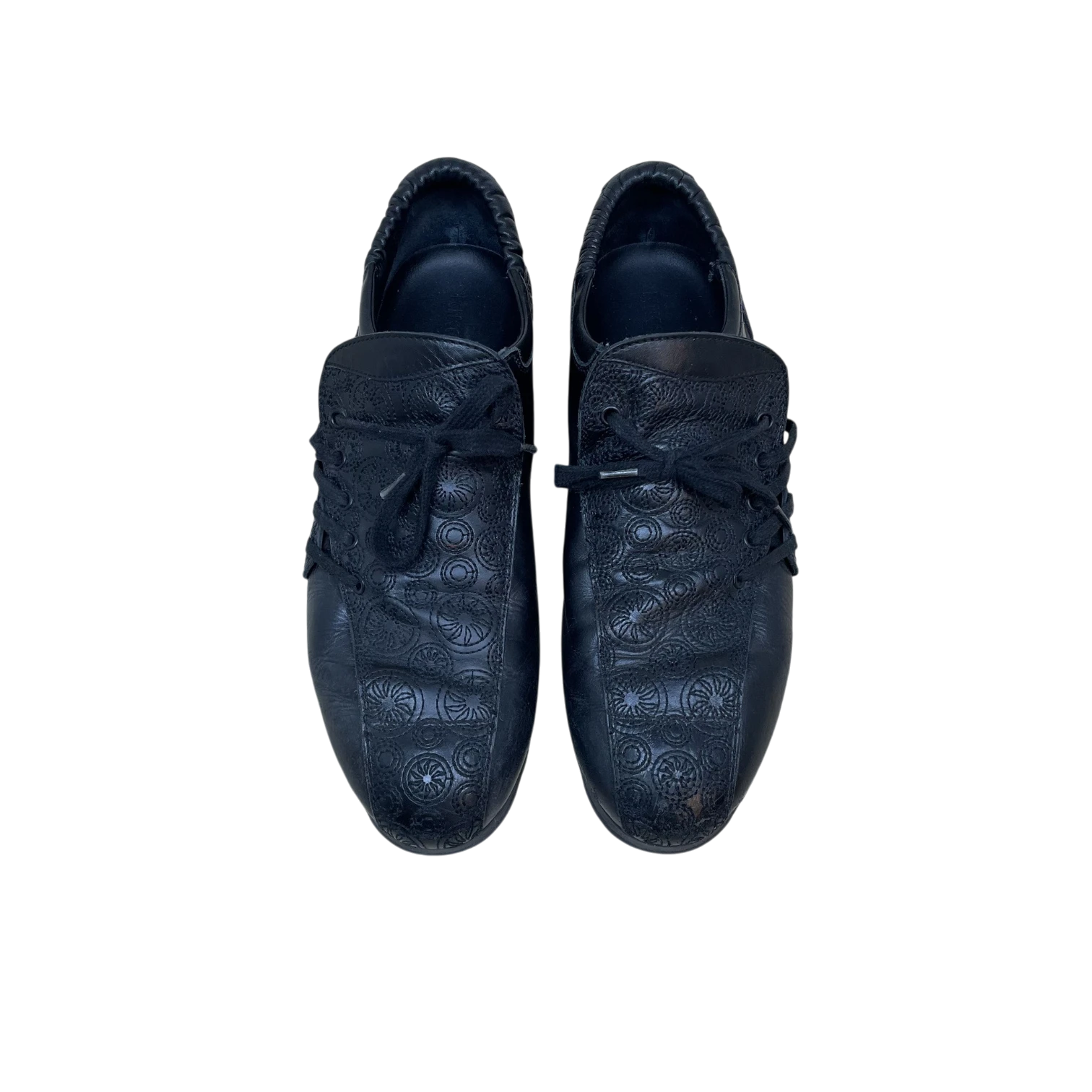 Zenno Archive Kiko Kostadinov Haidu black leather lace-up shoes with intricate circular embossed patterns.