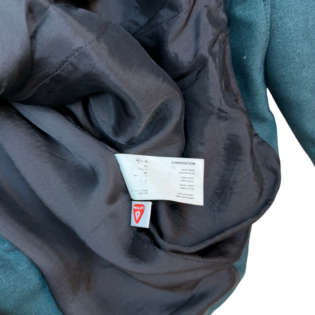 Zenno Archive Kiko Kostadinov Vein jacket interior showing composition label and Primaloft insulation tag