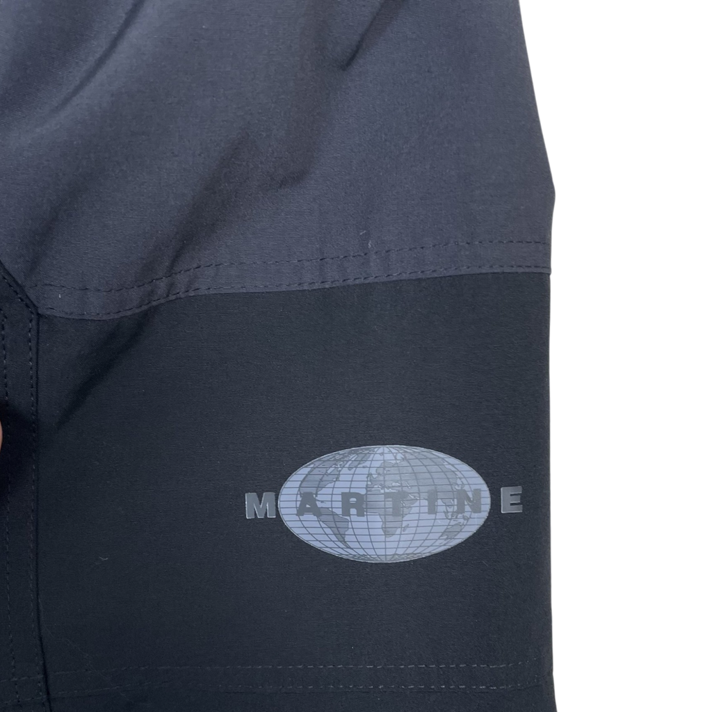 Zenno Archive Martine Rose shrunken sports jacket in black and grey with globe logo detail on the sleeve