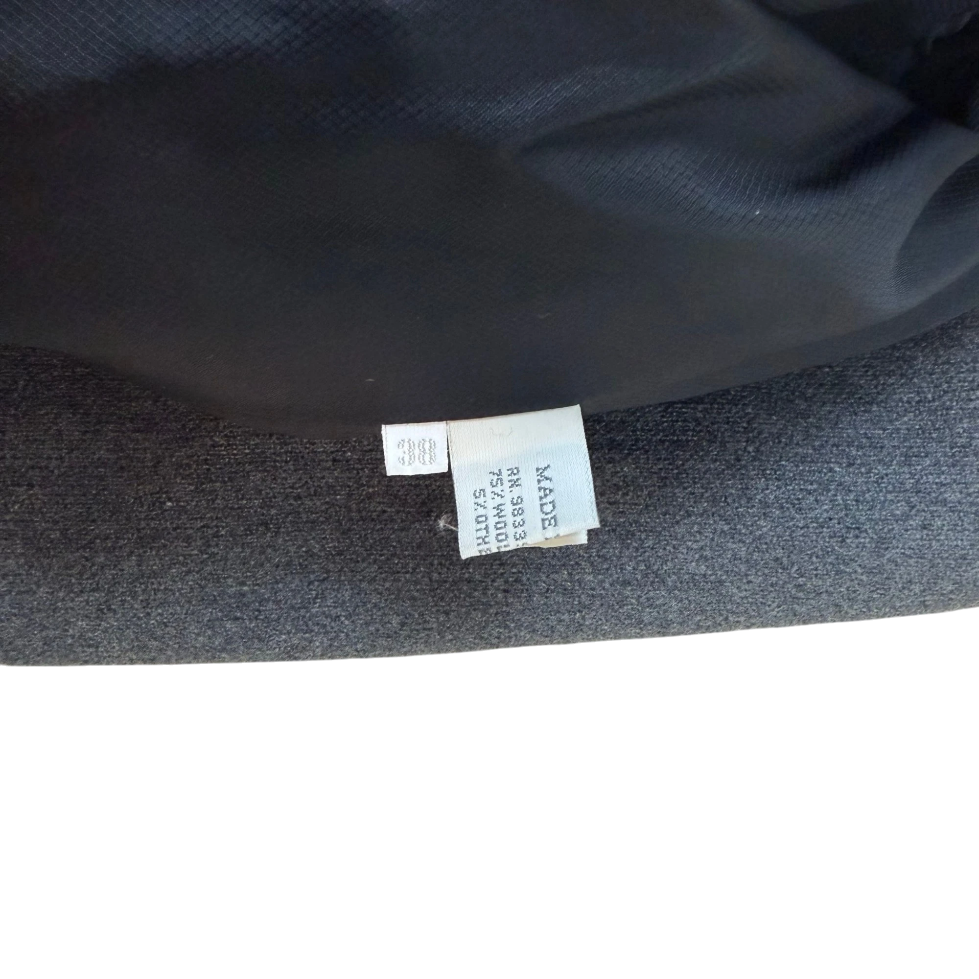 Zenno Archive Miu Miu FW98 grey wool coat interior label showing material composition and size 38