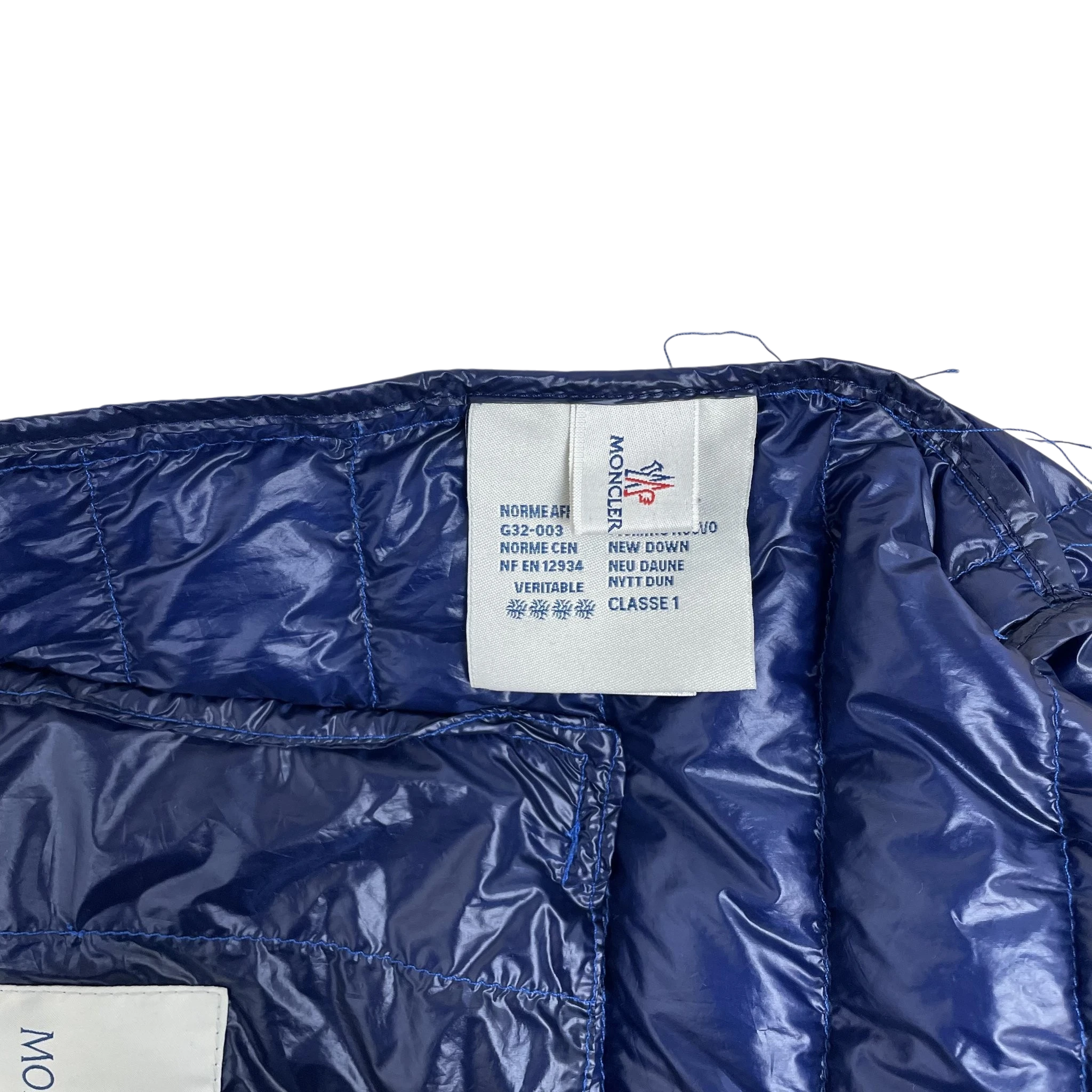 Zenno Archive Moncler Dominic Giubotto down jacket interior label in cobalt blue quilted nylon fabric