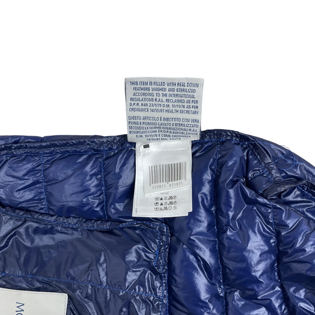 Zenno Archive Moncler Dominic Giubotto down jacket interior label with care instructions and barcode on cobalt blue