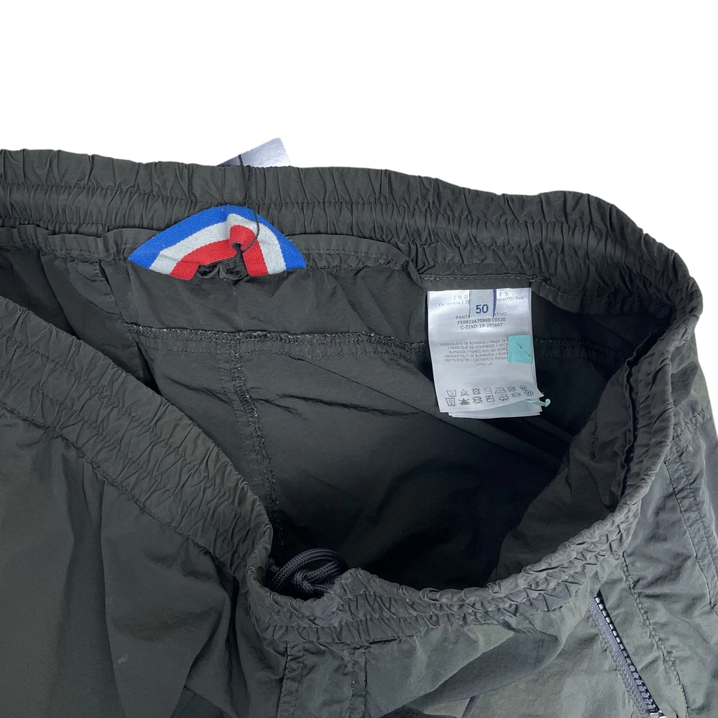 Zenno Archive Moncler 1952 dark green nylon pants featuring an elastic waistband and interior tricolor detail