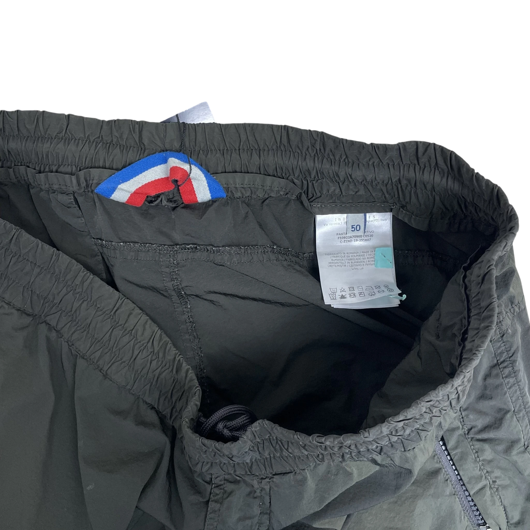 Zenno Archive Moncler 1952 dark green nylon pants featuring an elastic waistband and interior tricolor detail