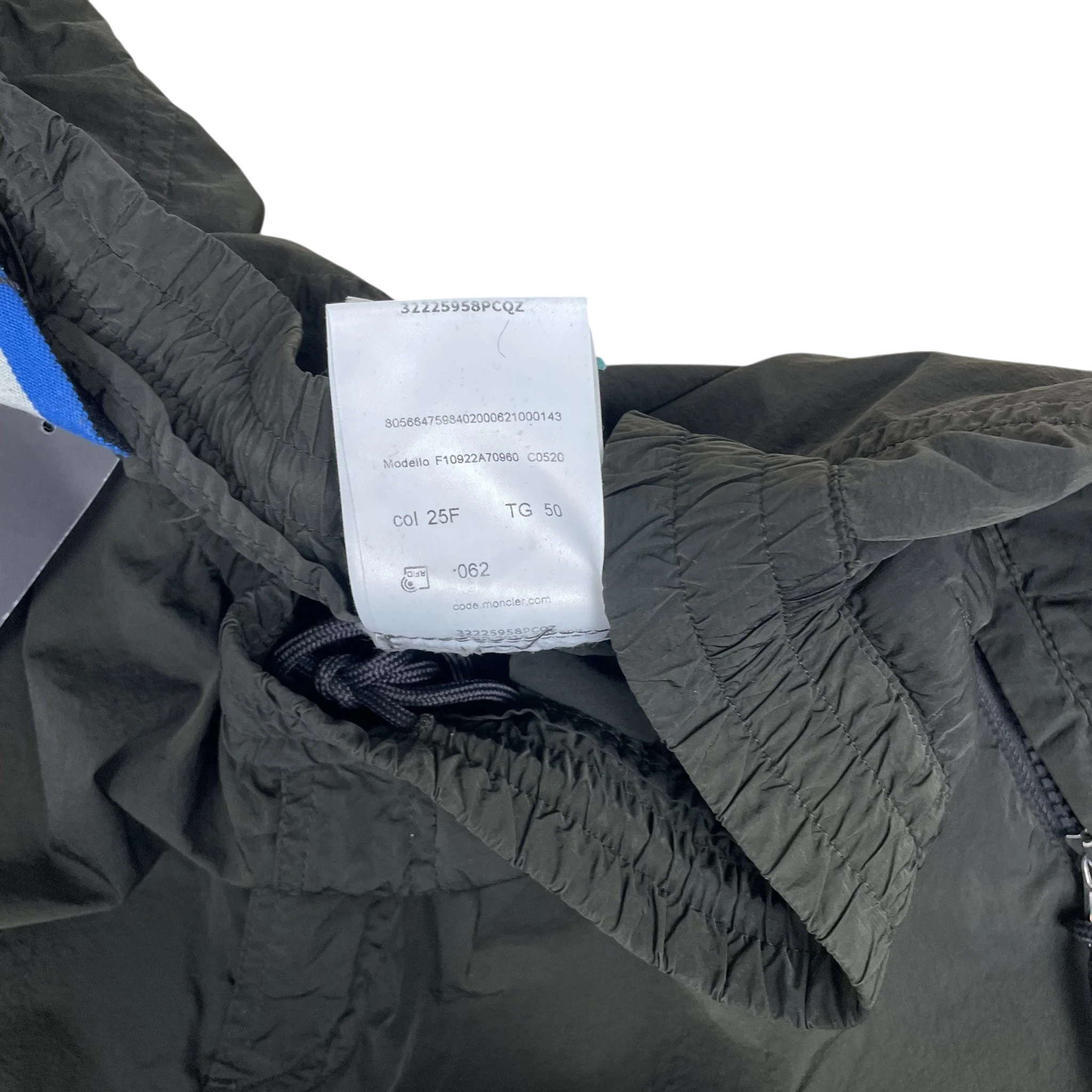 Zenno Archive Moncler 1952 dark green nylon pants featuring an internal size 50 label and elasticated waistband