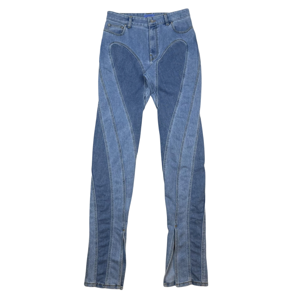 Zenno Archive Mugler light blue denim jeans featuring signature spiral paneling and side slits at the hem.