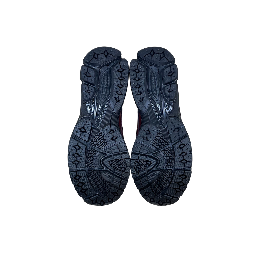 Zenno Archive New Balance 1906L maroon crocodile loafers showing the black rubber outsoles from a bottom view