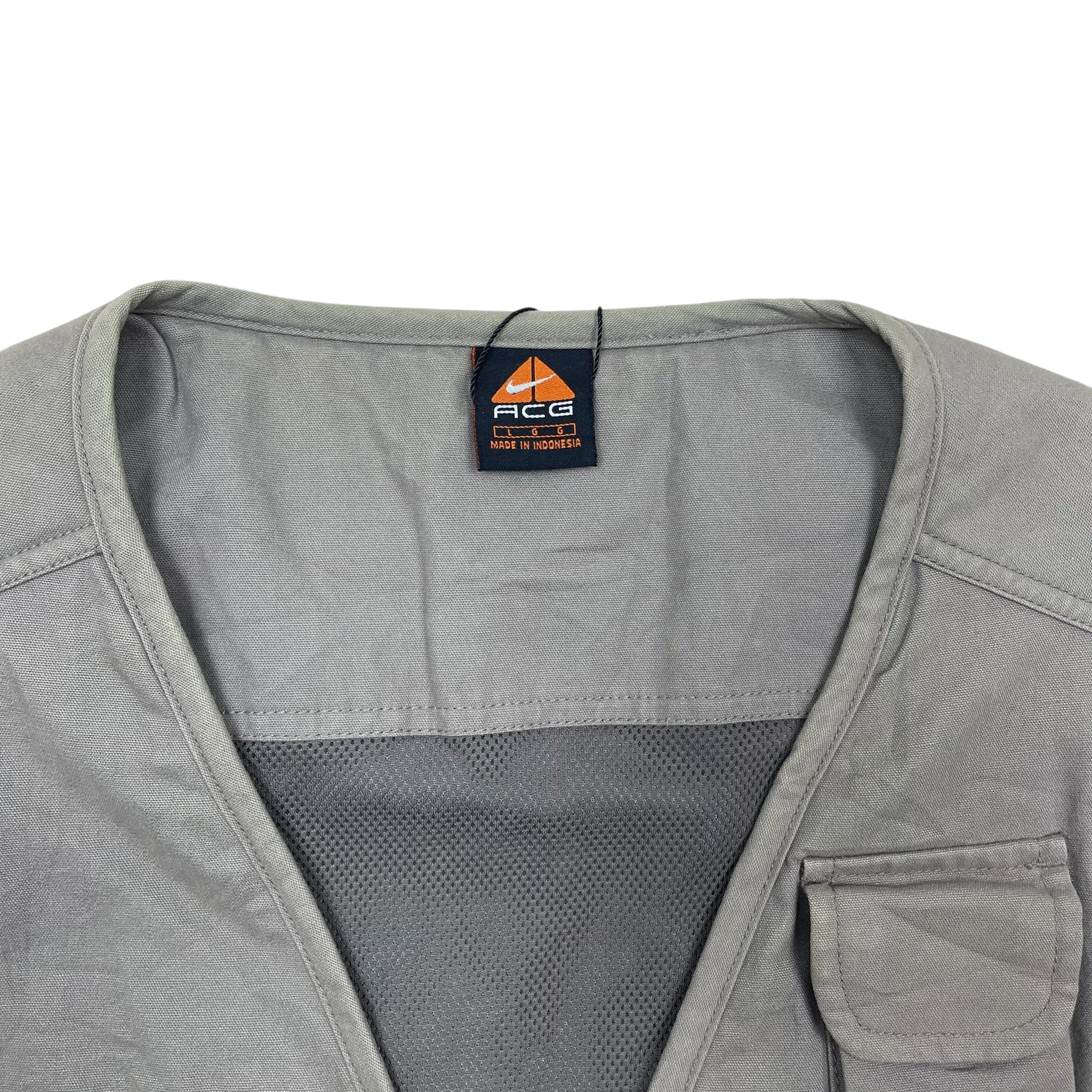 Zenno Archive Nike ACG 90s tactical vest in brown with mesh detailing and interior size L label