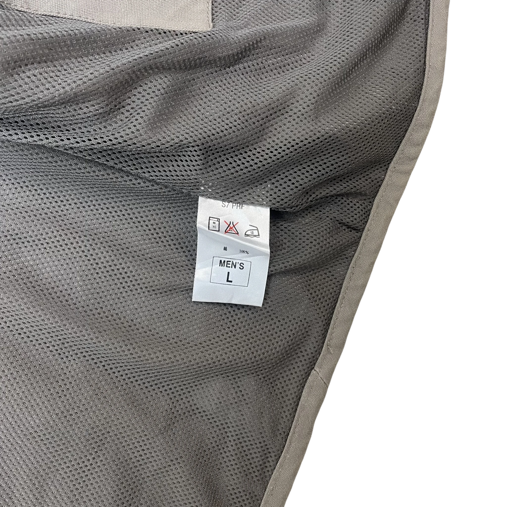Zenno Archive Nike ACG 90s tactical vest interior showing grey mesh lining and size L care label