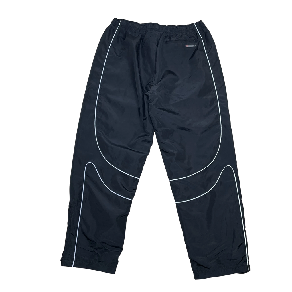 Zenno Archive Nike x Corteiz black track pants with white 3M reflective piping details, back view