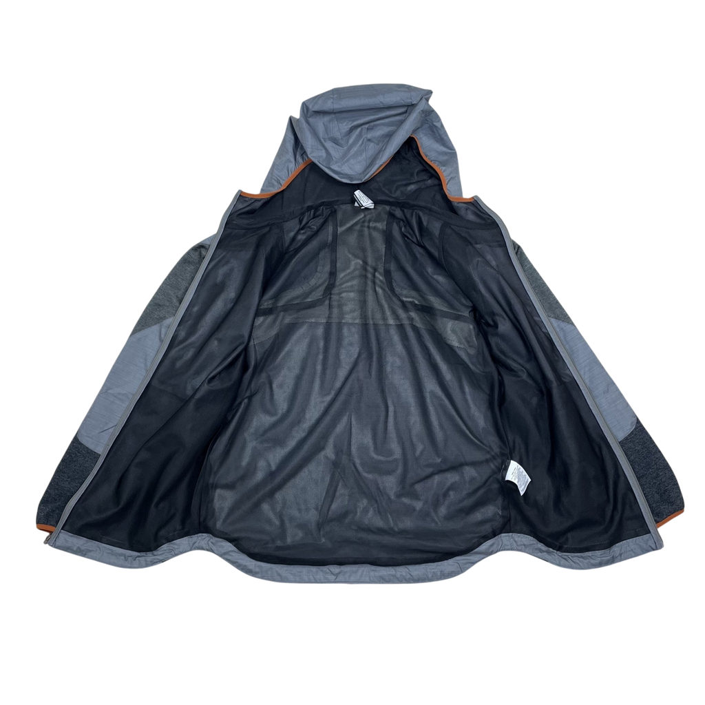 Zenno Archive Nike x Undercover Gyakusou grey technical running jacket with black mesh lining and orange trim