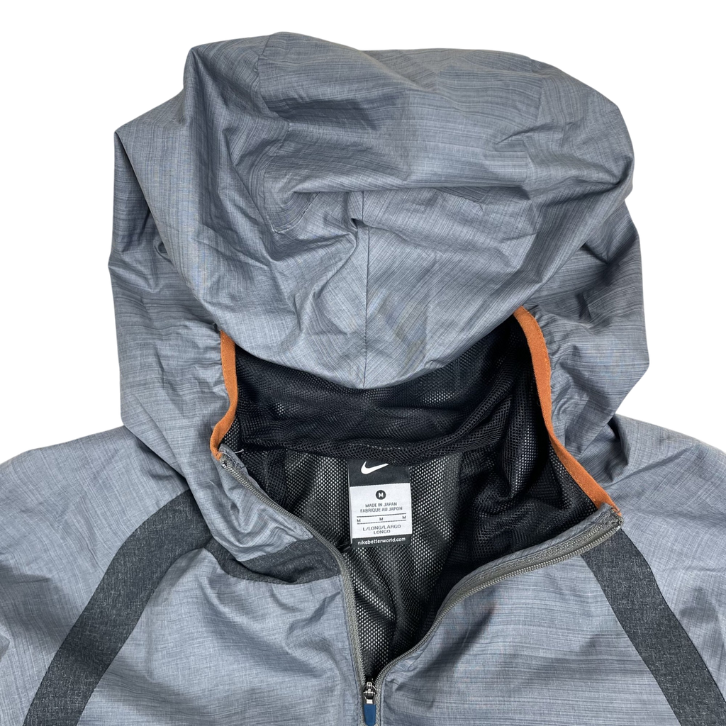 Zenno Archive Nike x Undercover Gyakusou 2011 grey technical running jacket with hood and orange trim detail