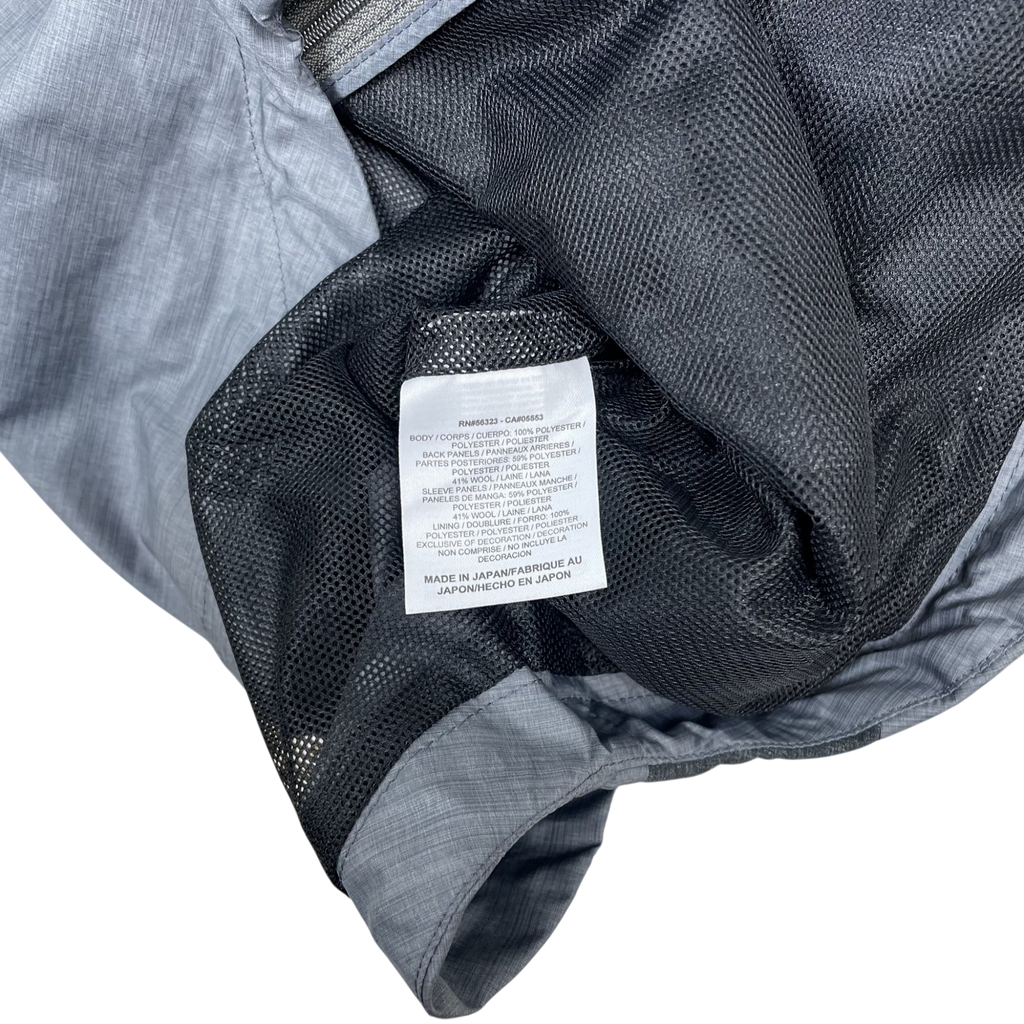 Zenno Archive Nike x Undercover Gyakusou technical jacket grey interior care label with wool and polyester blend