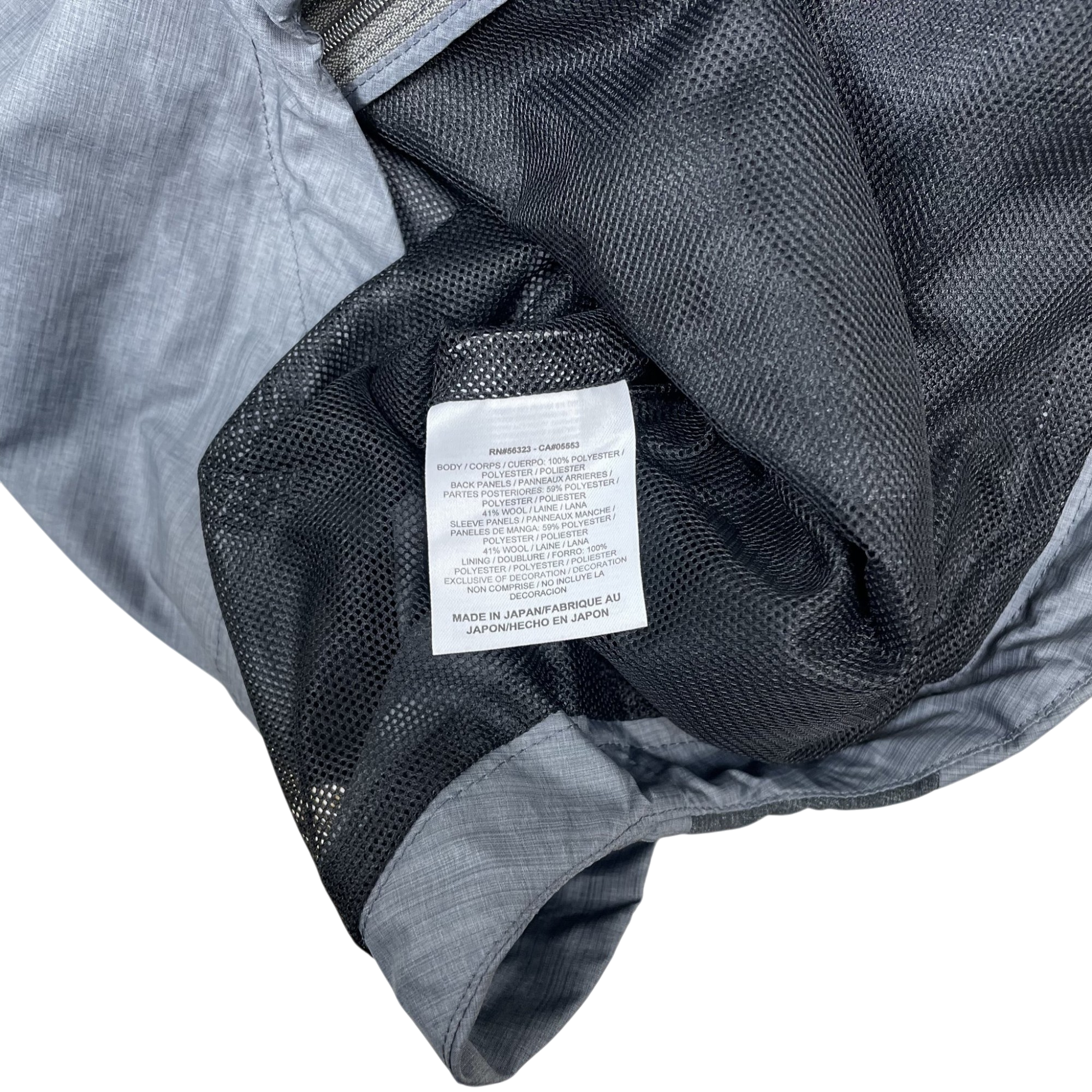 Zenno Archive Nike x Undercover Gyakusou technical jacket grey interior care label with wool and polyester blend