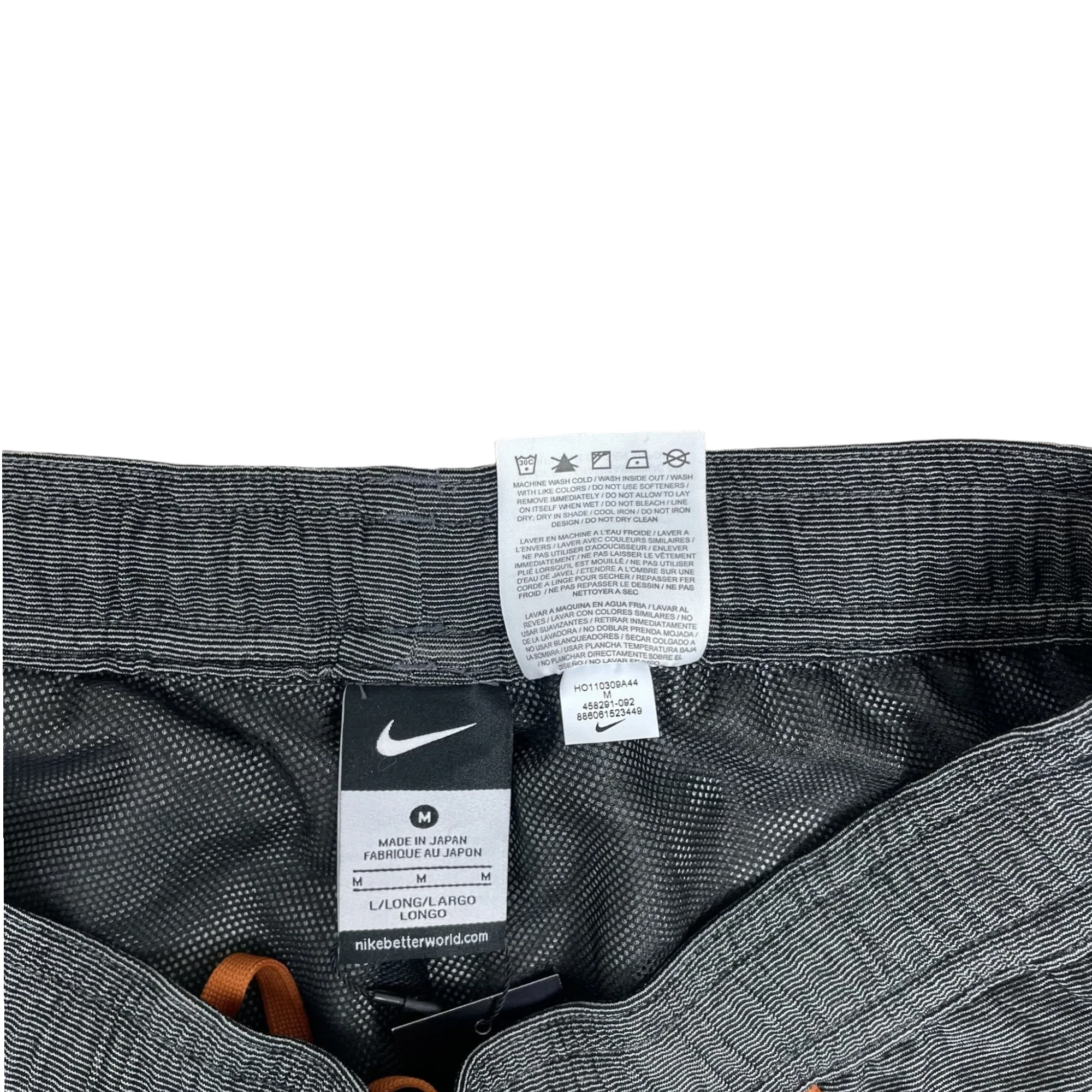 Zenno Archive Nike x Undercover Gyakusou technical running pants interior care label and size M tag in grey
