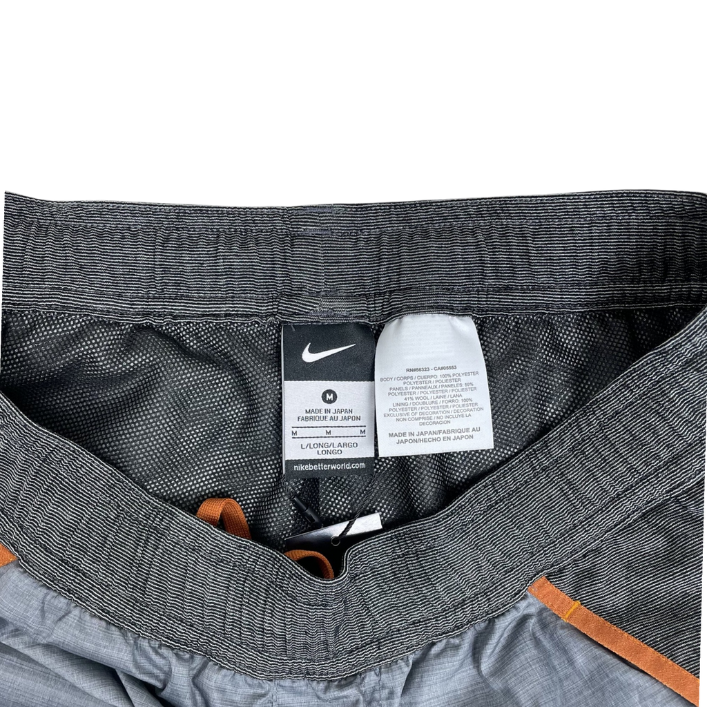 Zenno Archive Nike x Undercover Gyakusou running pants interior waistband with size M tag and care label