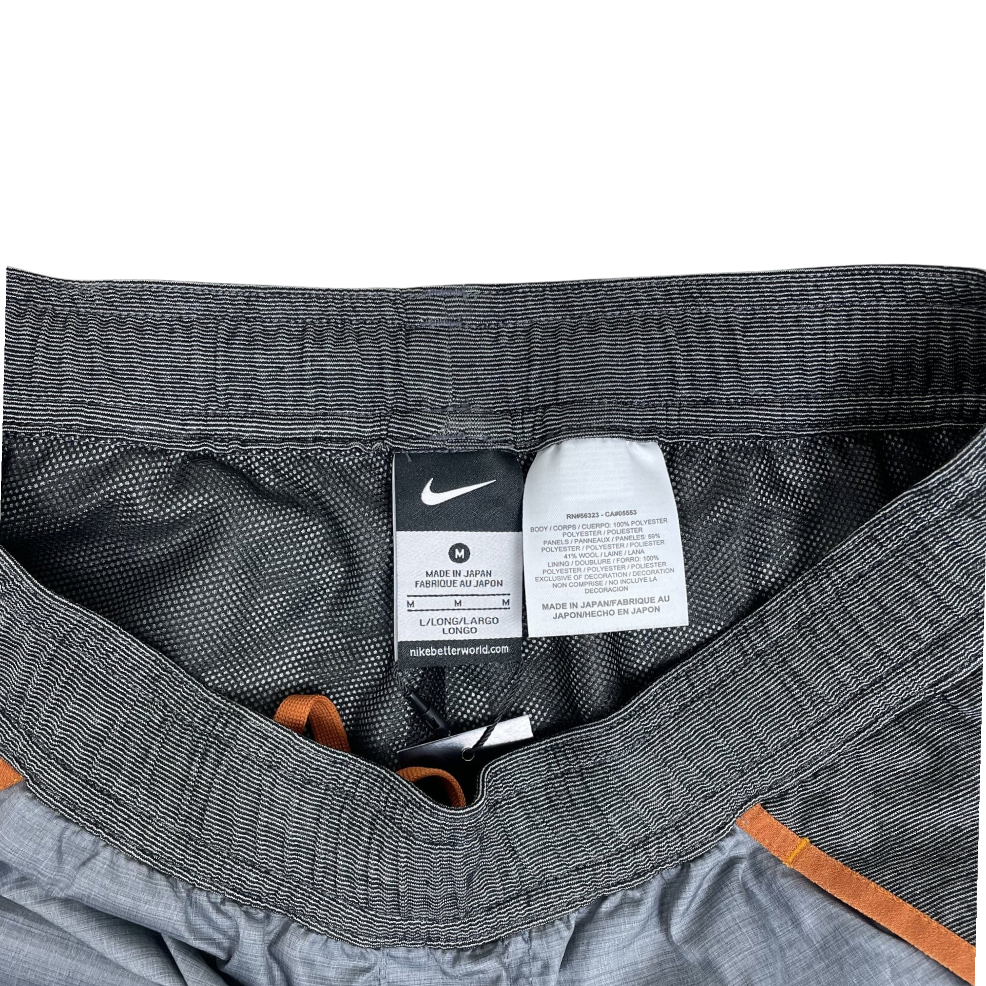 Zenno Archive Nike x Undercover Gyakusou running pants interior waistband with size M tag and care label