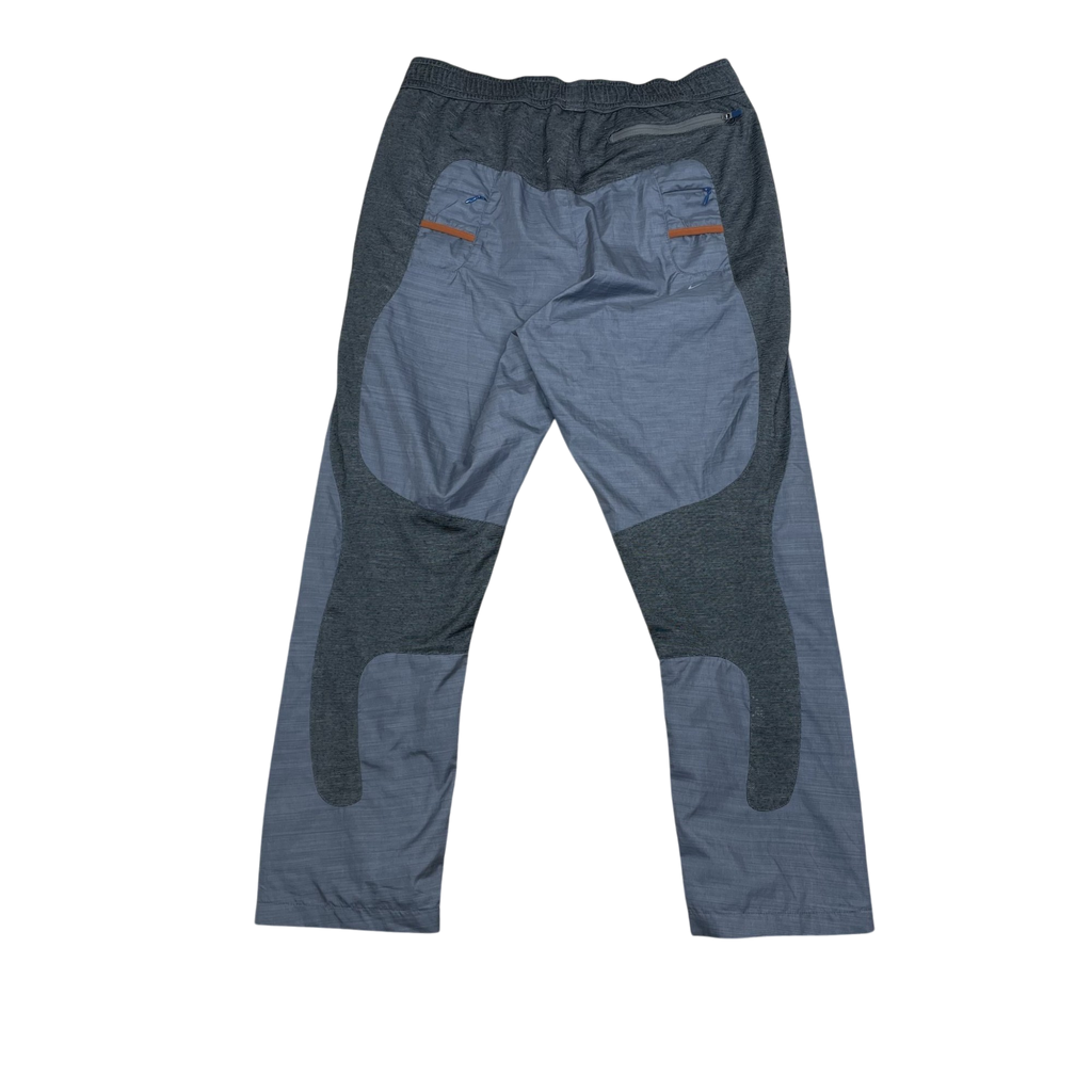 Zenno Archive Nike x Undercover Gyakusou 2011 grey technical running pants with contrast panels and zipper pockets