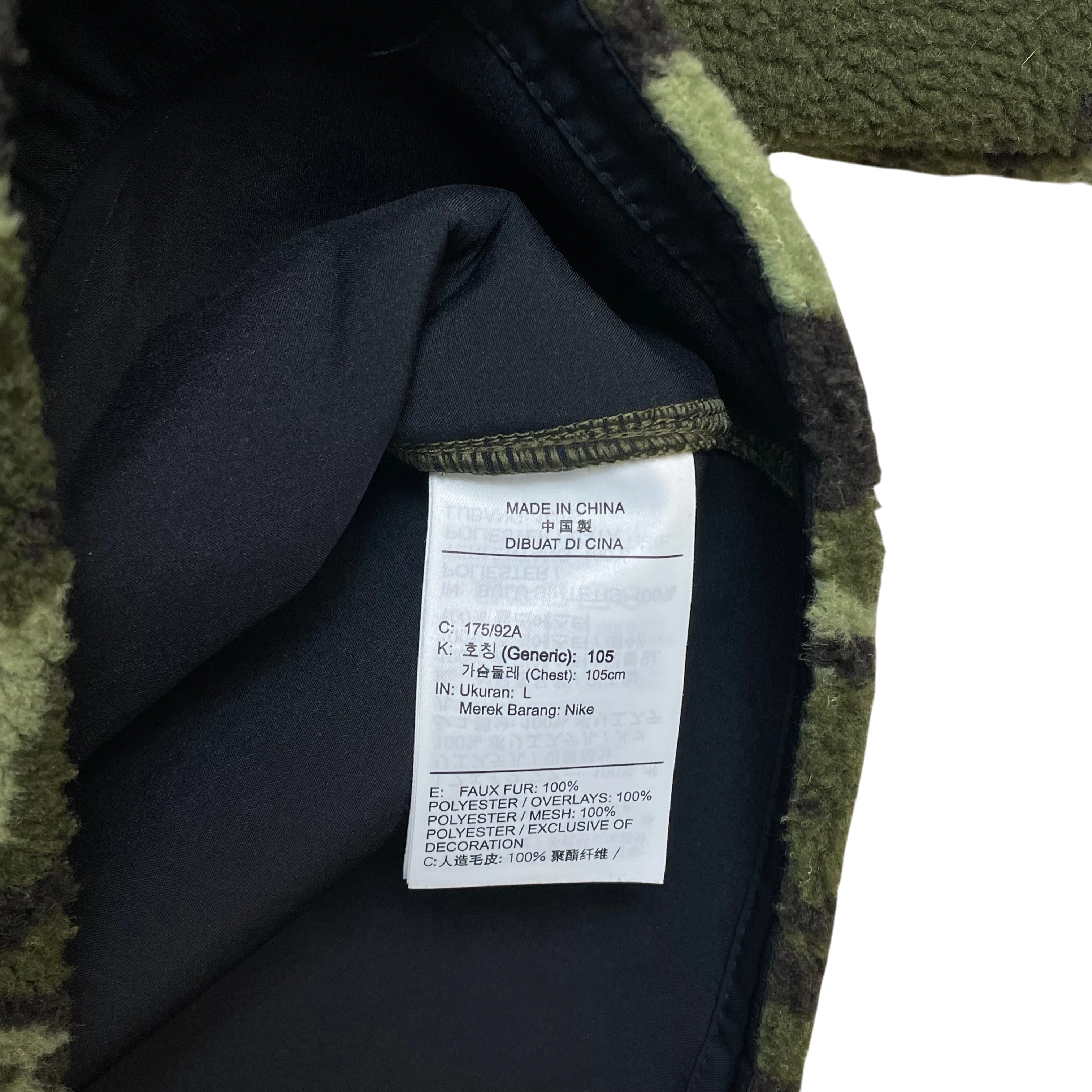 Zenno Archive Nike x MMW fleece jacket interior care label showing material composition and size L details