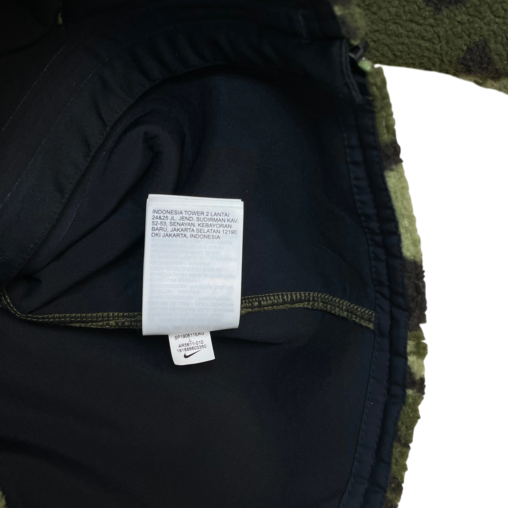 Zenno Archive Nike x MMW SS19 fleece jacket interior label showing product details and Nike branding