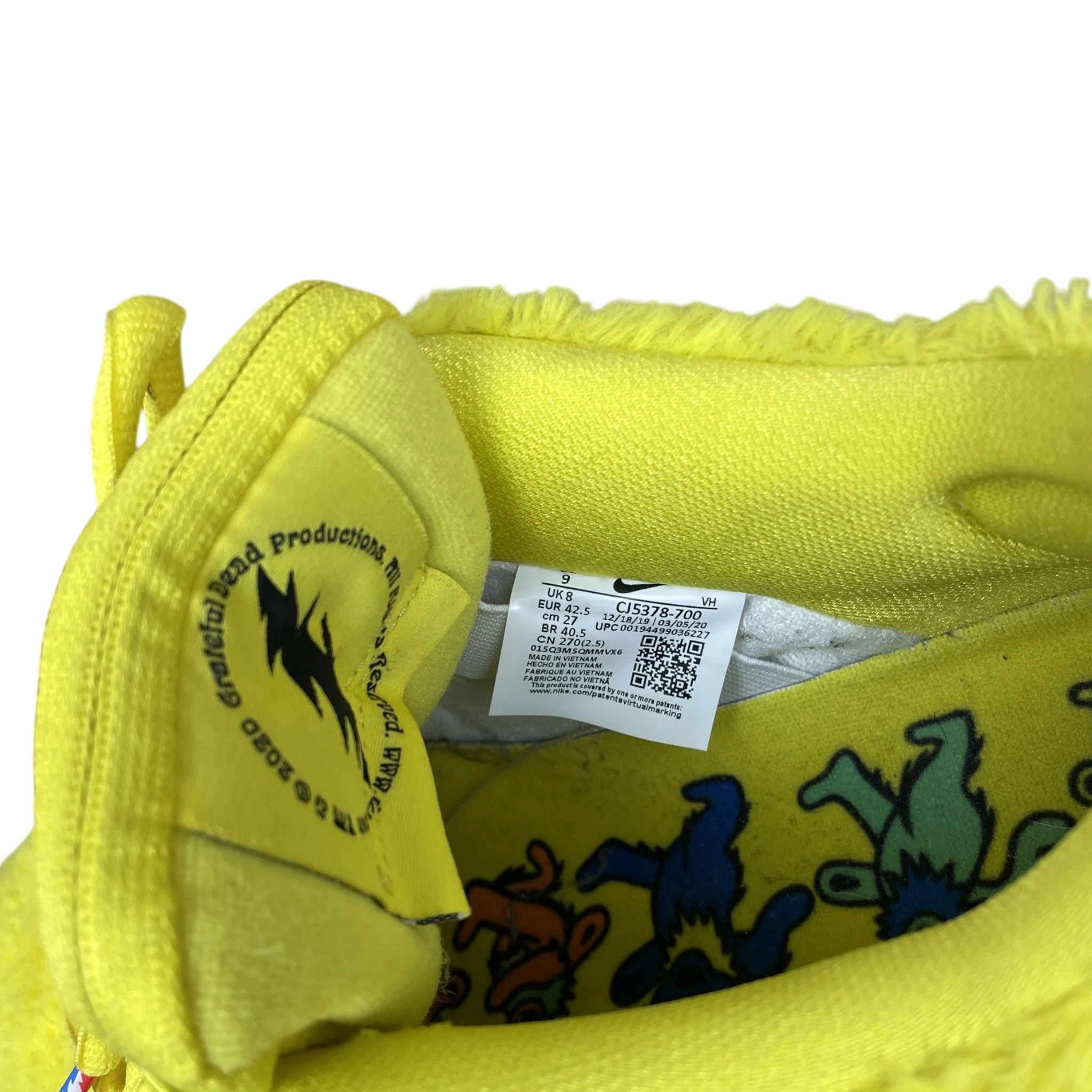 Zenno Archive Nike SB Dunk Low Grateful Dead yellow fuzzy sneaker interior showing size tag and graphic insole