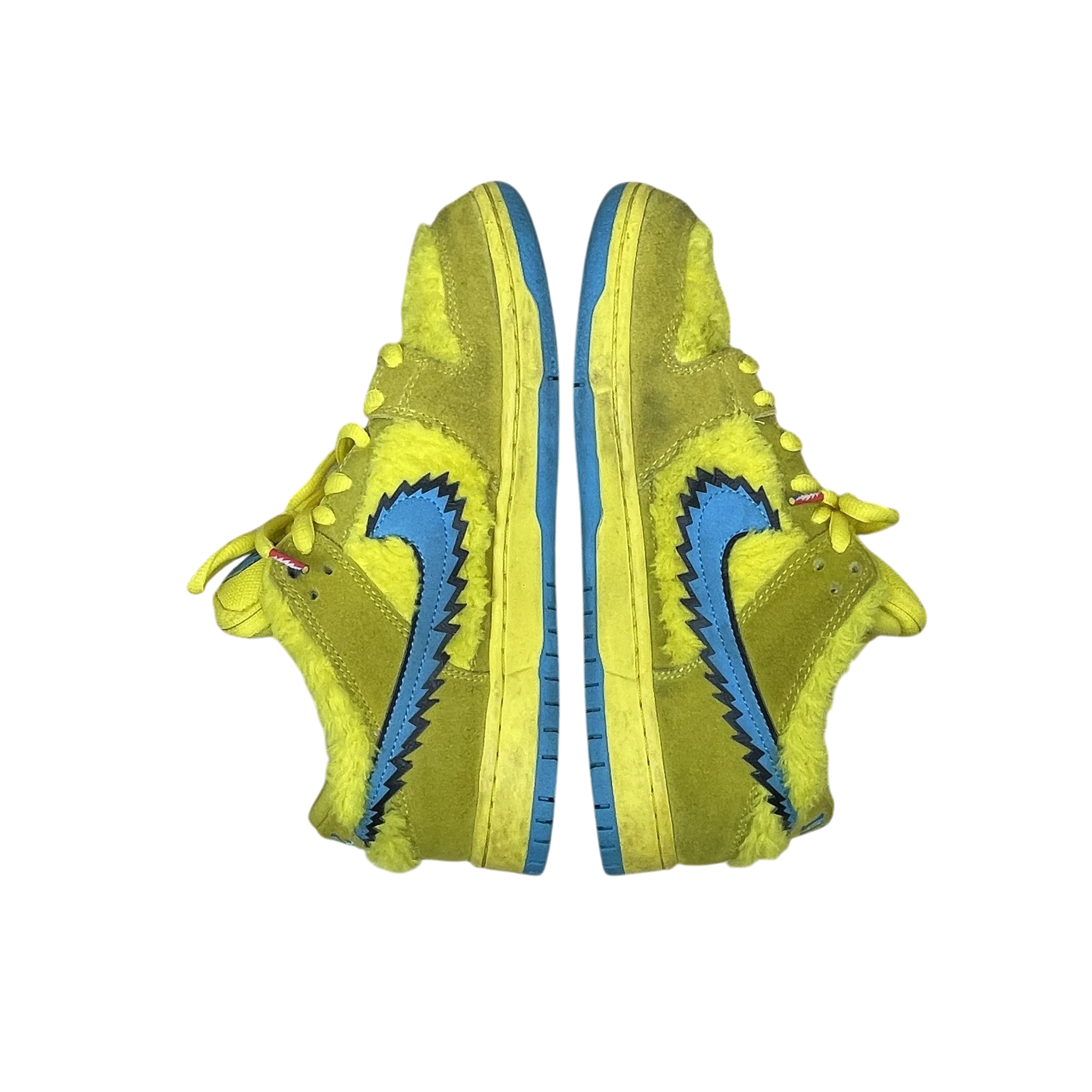 Zenno Archive Nike SB Dunk Low Grateful Dead sneakers in yellow faux fur with blue jagged swoosh on a grey background