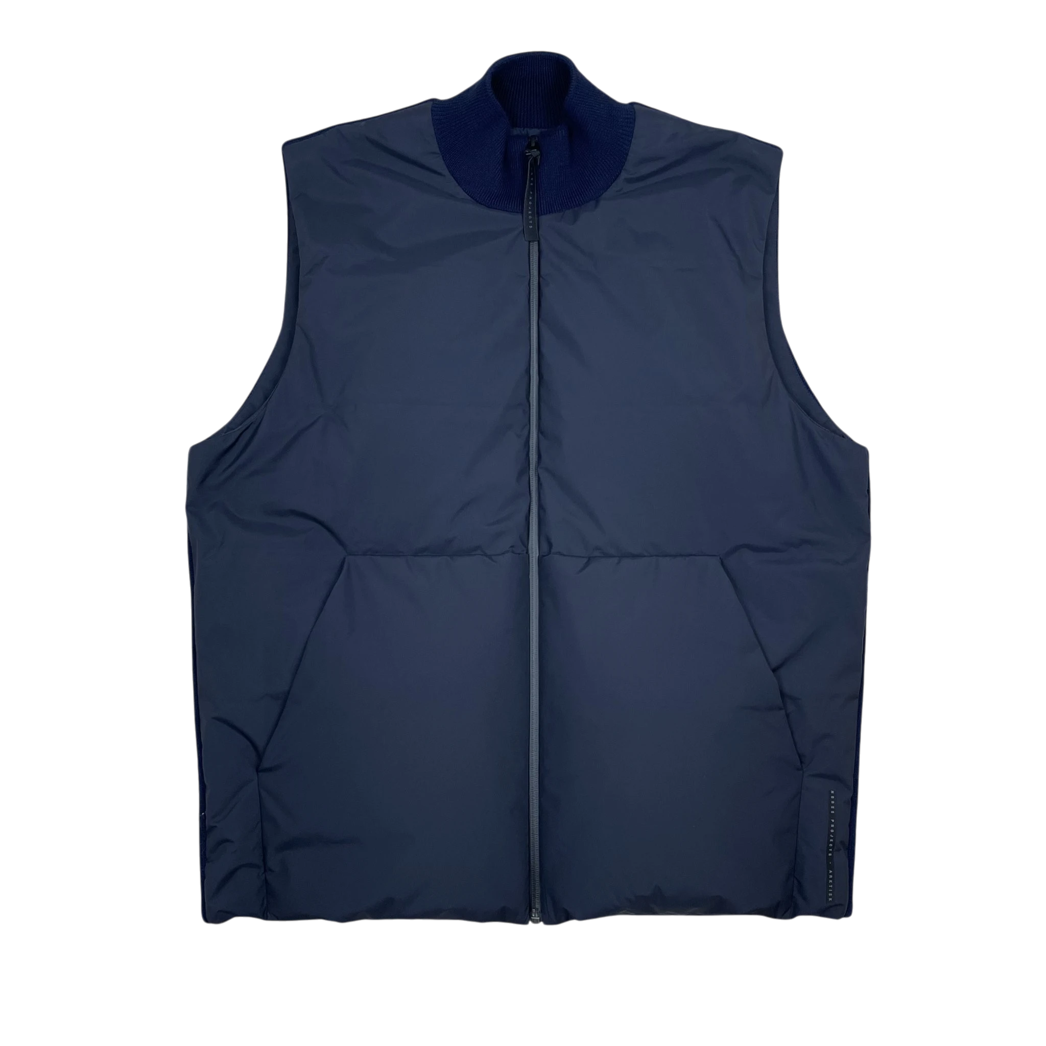 Zenno Archive Norse Projects ARKTISK navy blue hybrid down vest with a ribbed collar and full zip closure.