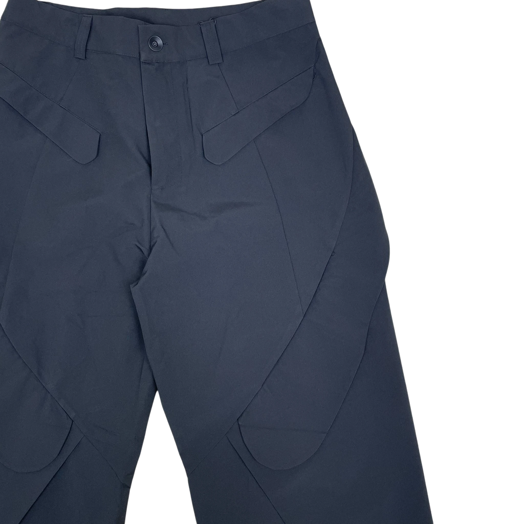 Zenno Archive Nouveou Project technical trousers in black featuring unique pocket flap detailing and structured seams.