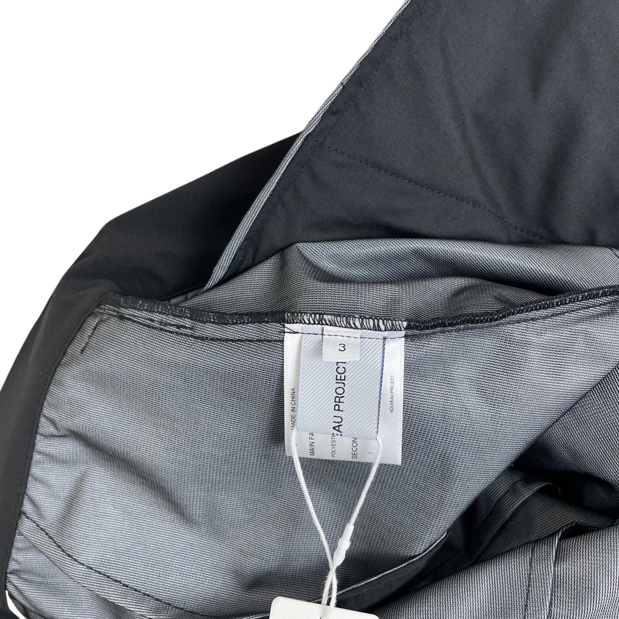 Zenno Archive Nouveou Project technical trousers interior label and grey lining detail
