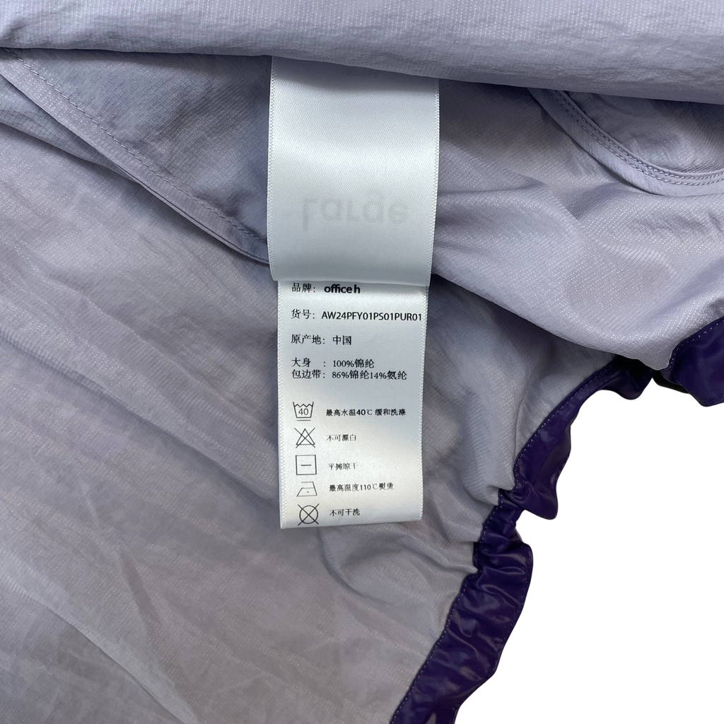Zenno Archive Office H nylon hooded jacket interior care label with purple fabric and elasticated hem detail