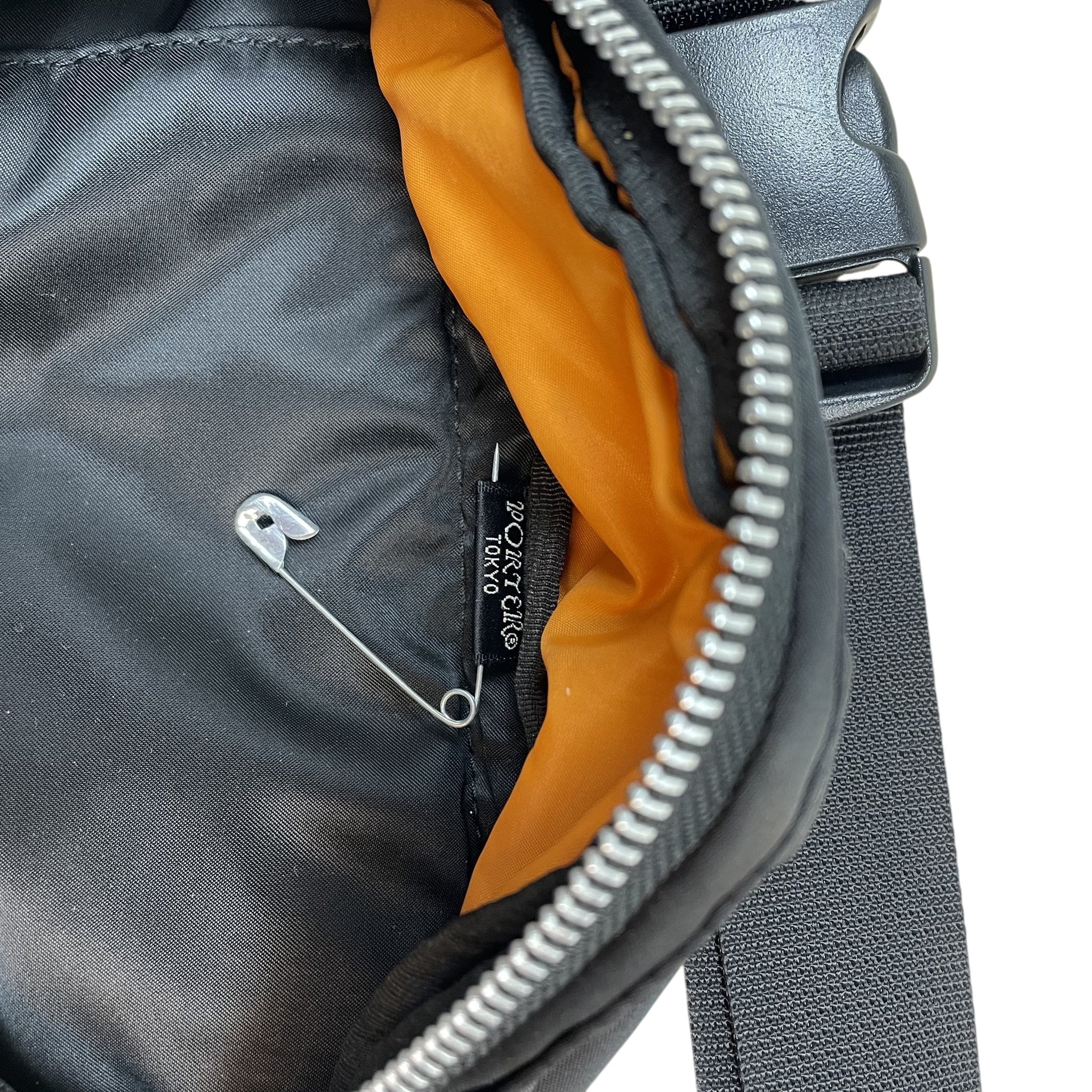Zenno Archive Porter Tanker waist bag in black nylon with signature bright orange lining and interior brand label